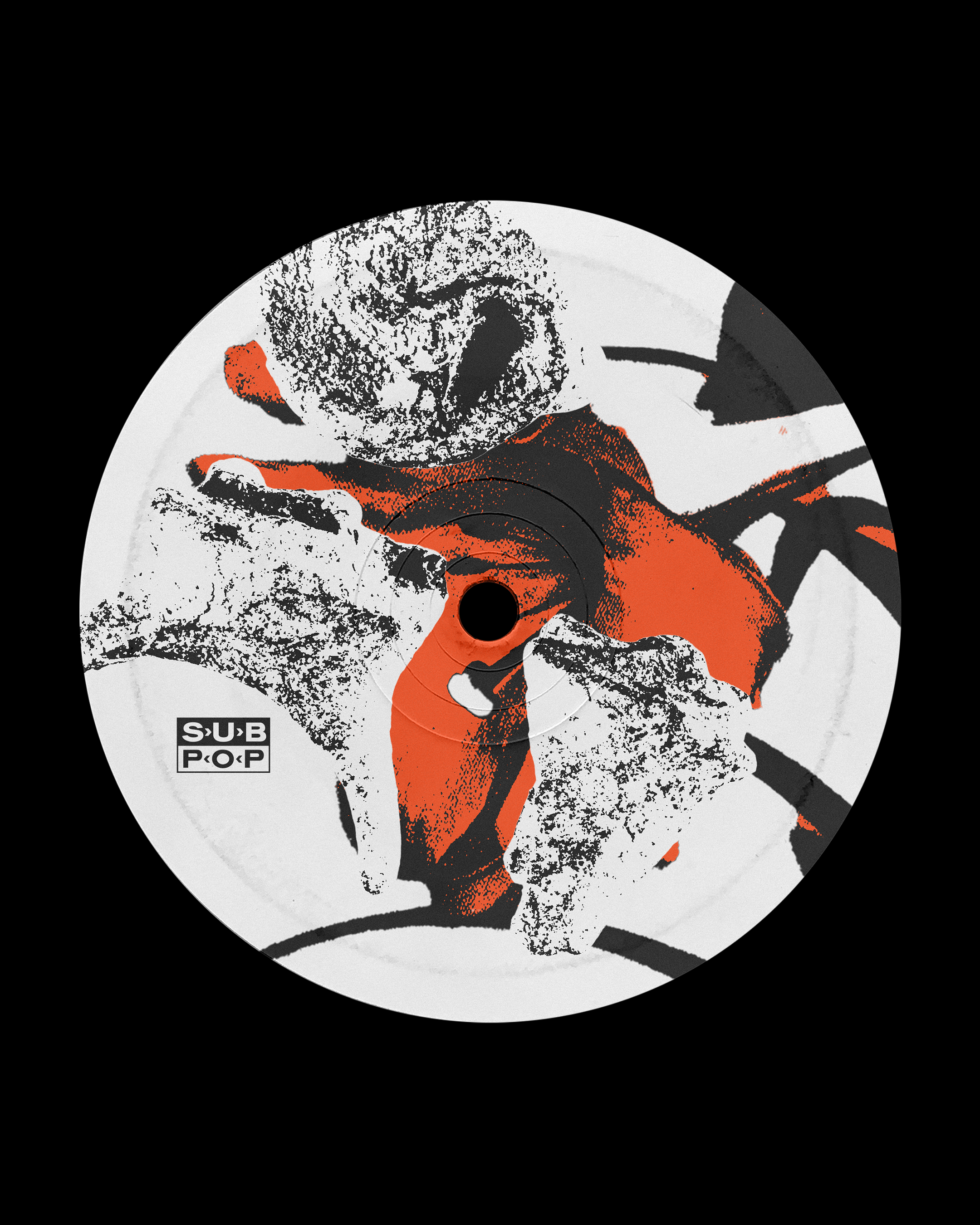 Abstract design on Sub Pop record label with black, red, and white colors.