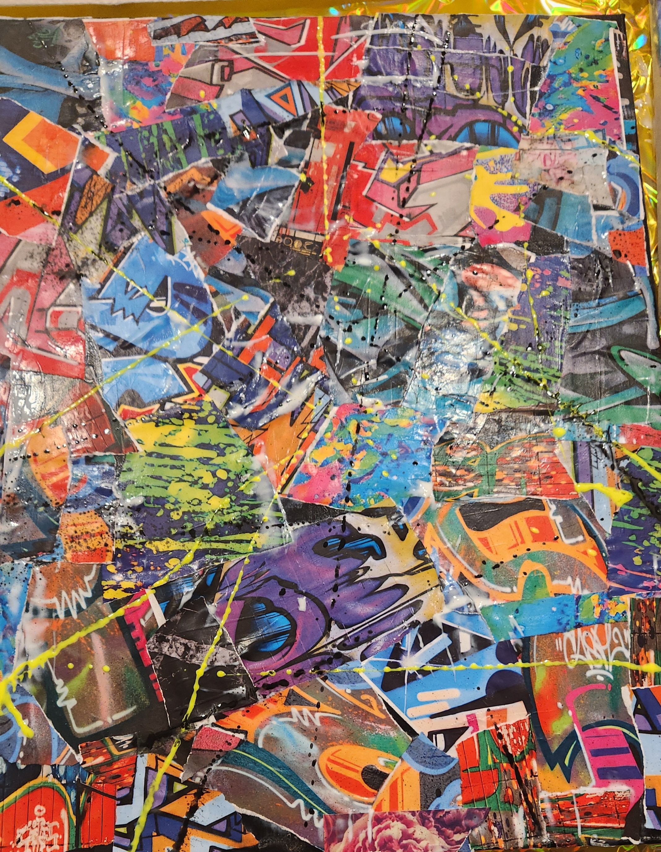 A collage of abstract graffiti art with various colors, shapes, and patterns, including splashes of yellow paint.