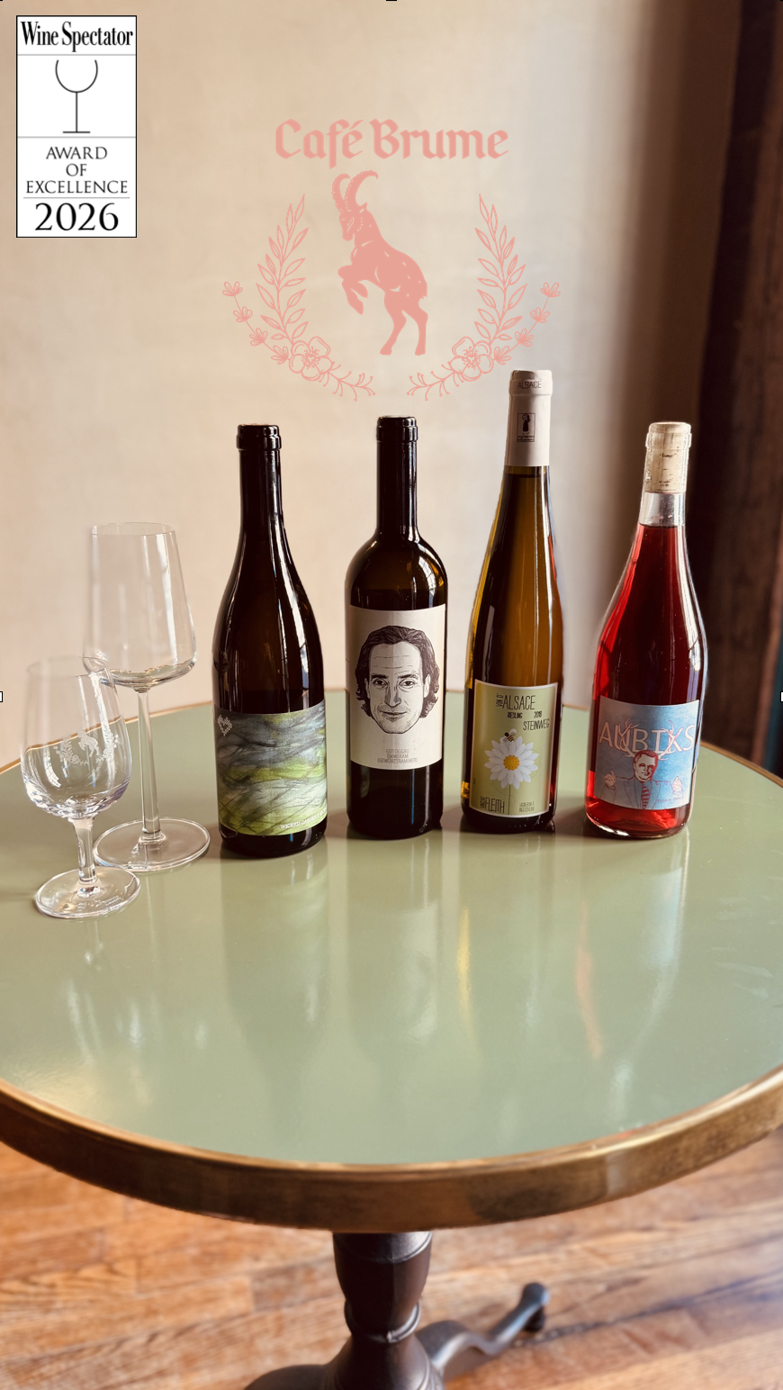 Four bottles of wine: Wicked Garden white blend, Christopher Heiss's Gruner, and our Podrum Rosé.