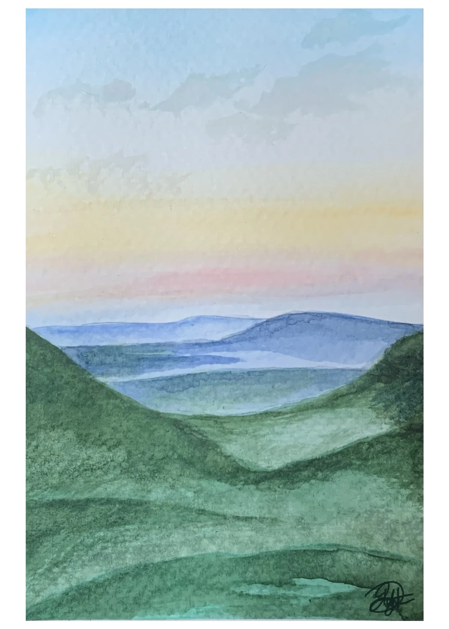 Watercolor landscape of rolling green hills in the foreground, blue mountains in the distance, and a pastel-colored sky with light clouds at sunset.