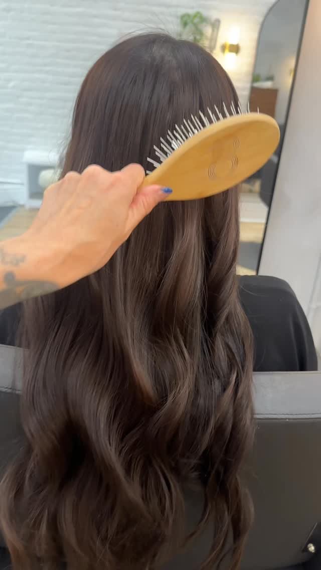 Custom color VIRGIN hair extensions for a perfect match. I lifted virgin level 3 hair extensions to create a rich warm brown to match the client’s natural.
She also has naturally dark hair so to left out the roots of the extensions so when he