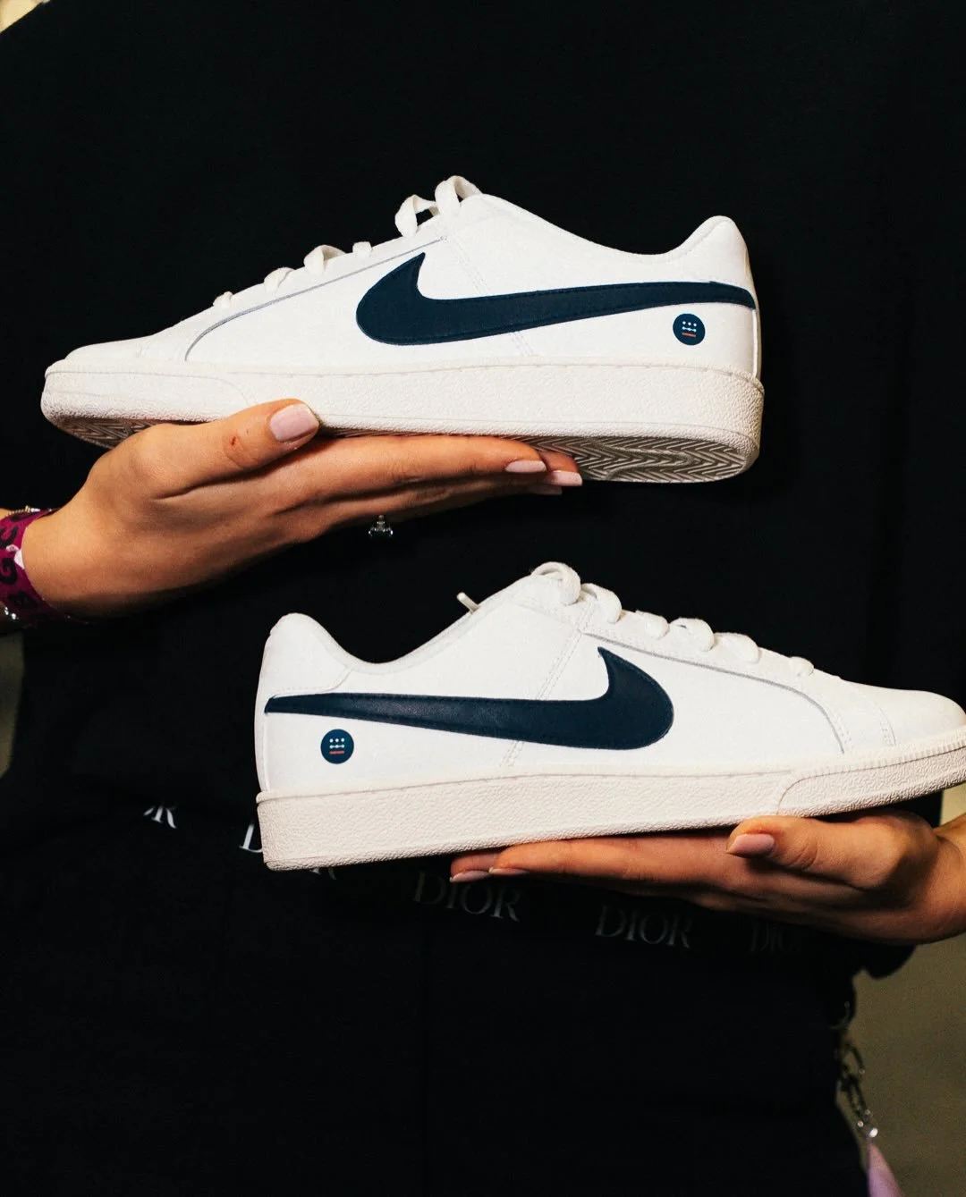 It begins with your brand: clean lines, signature colors, your logo, bespoke insoles.
Then the event becomes their atelier. Every guest becomes a designer. We add the magic.
A personal creation, grounded in your brand.
Message us to create an excepti
