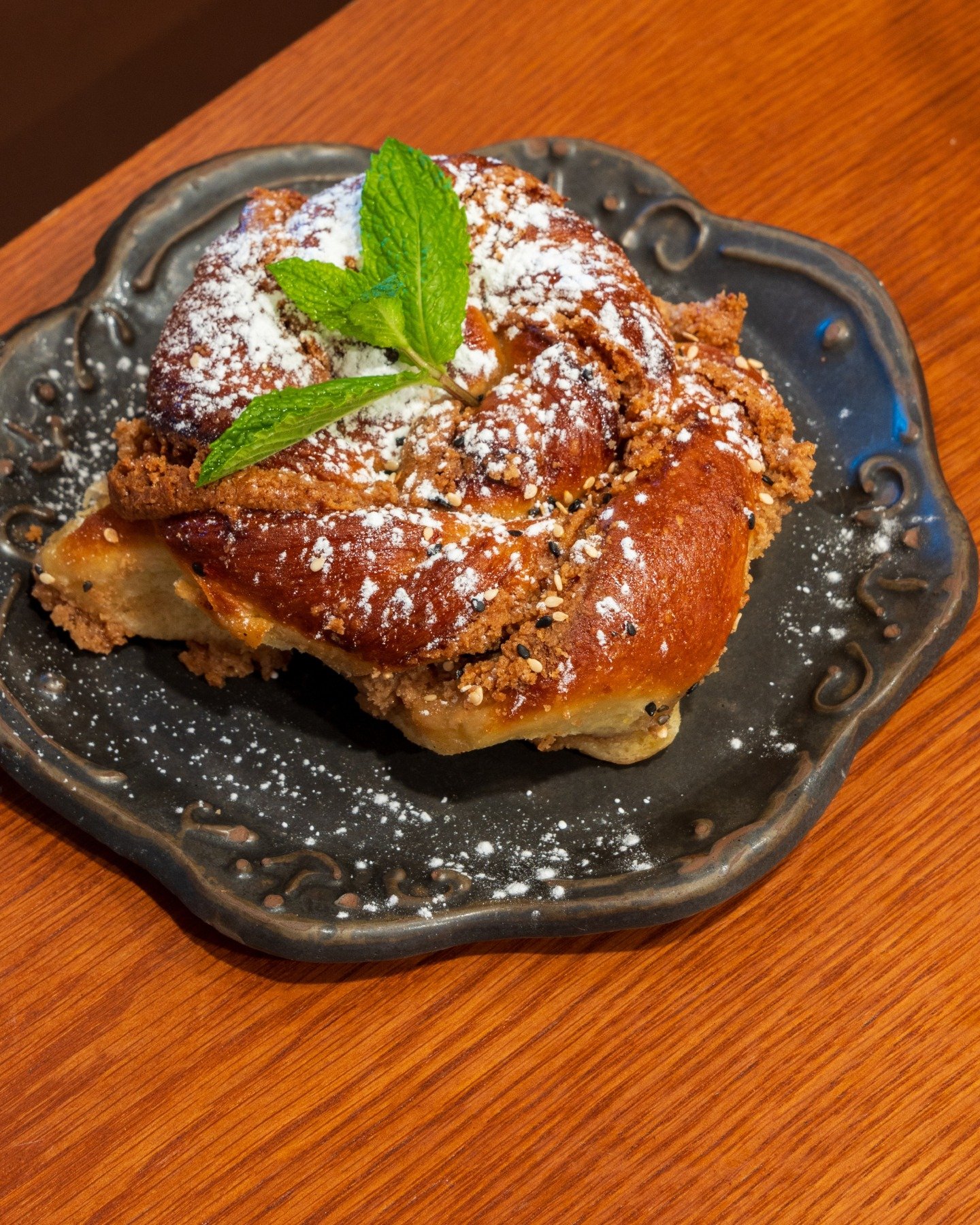 Weekend mornings have always called for something fresh from the oven.

Our Tahinopita carries that feeling to the table. A warm tahini cinnamon roll layered with cinnamon, finished with sesame, and baked by our pastry chef, Eva. 

Its the kind of di