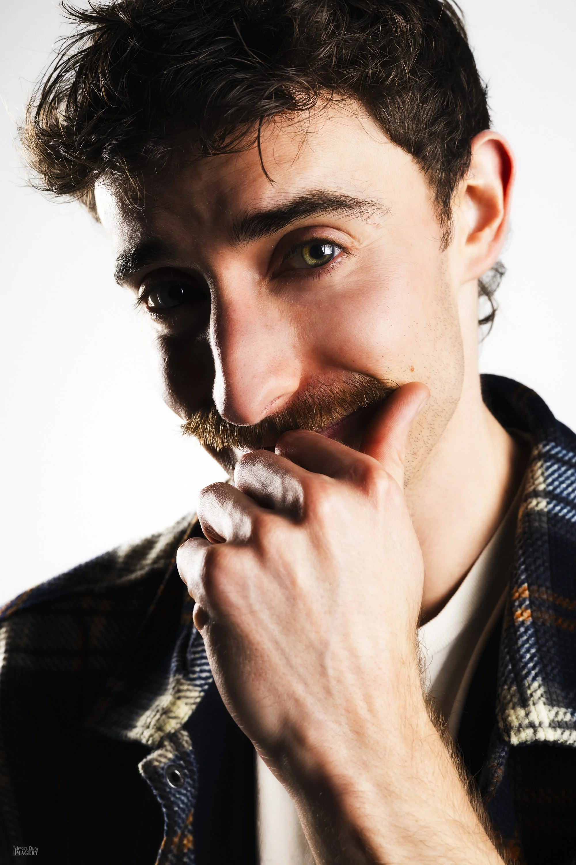 Studio portrait with simple background and strong expression koy.wav dj