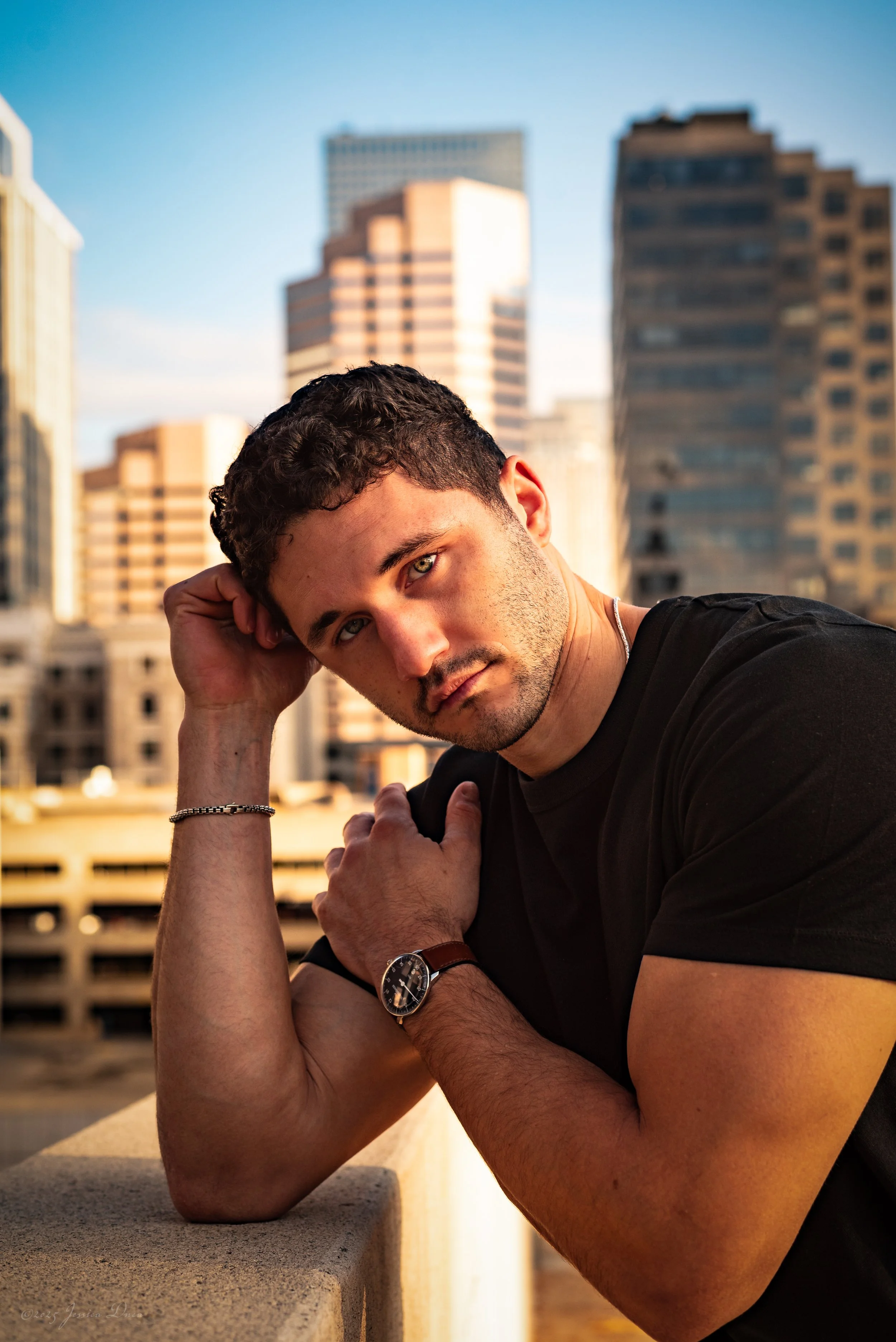 Downtown Denver branding photography by Jessica Dnea Imagery with urban textures, confident posing, lifestyle brand images, and professional portraits for promotion and social media.
