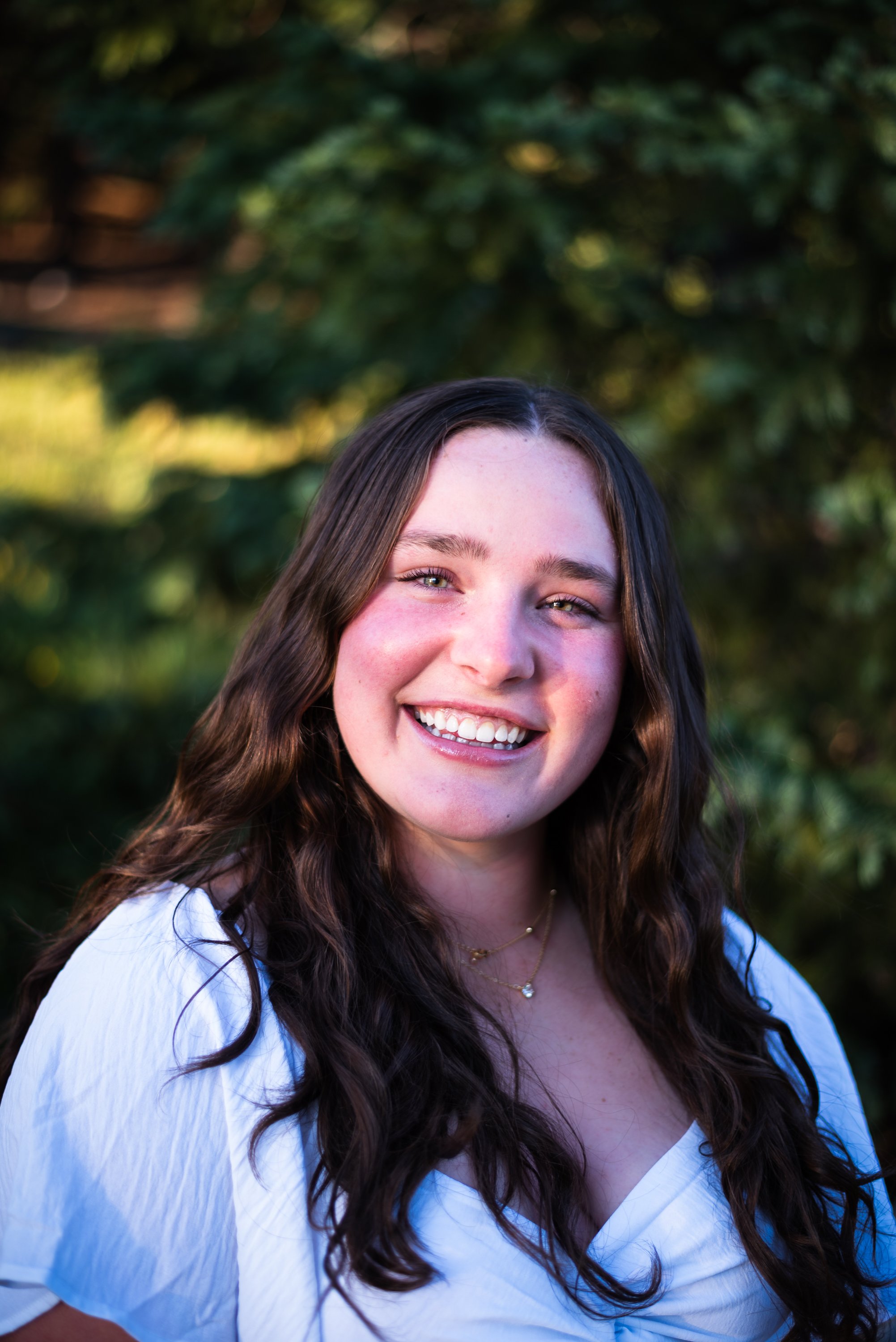 Colorado graduation photos by Jessica Dnea Imagery with alpine views, wildflower fields, mountain trails, natural light, and scenic outdoor senior portraits.