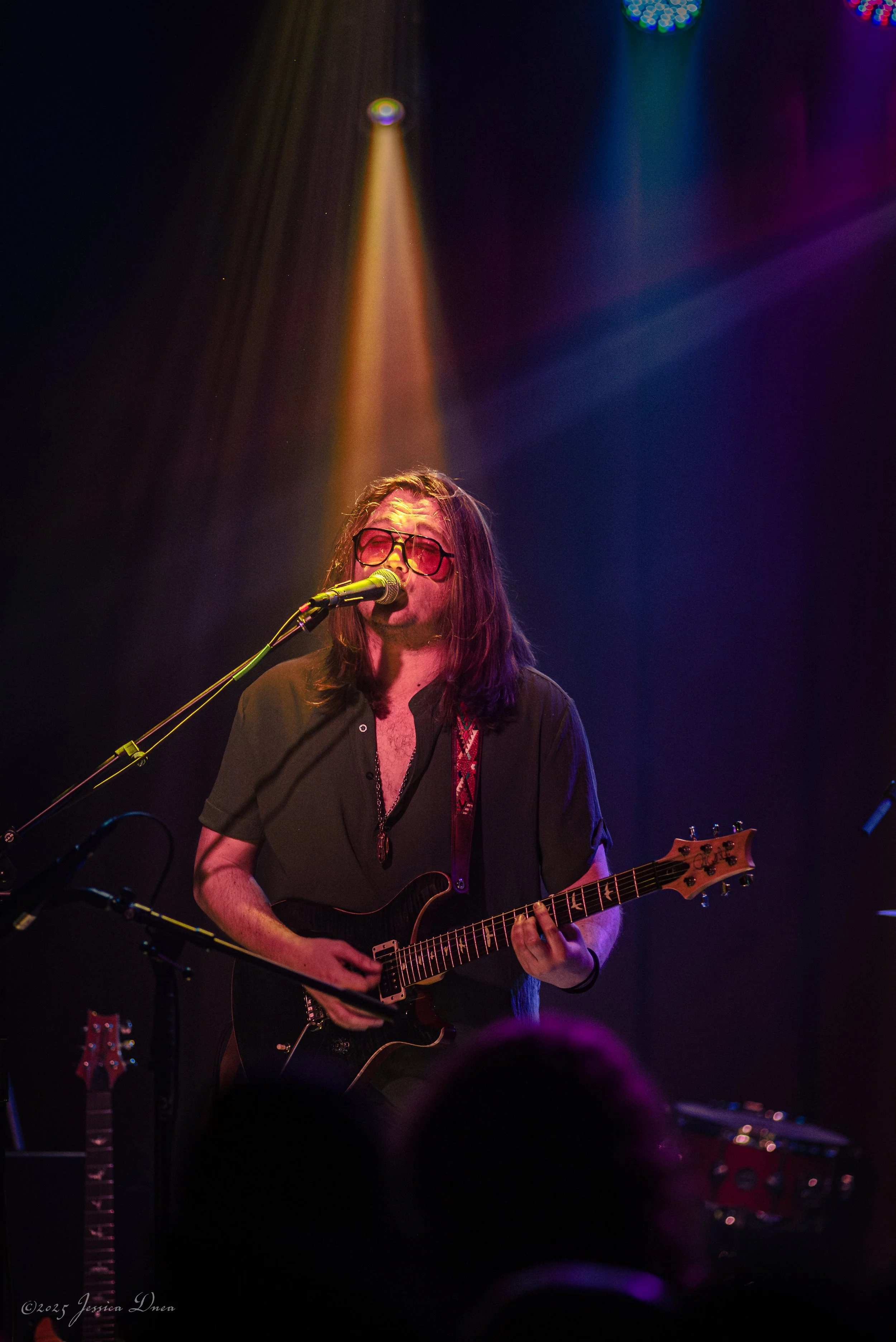 Live show photo with stage lighting and venue atmosphere Rado Denver, CO Dylan Tuthill