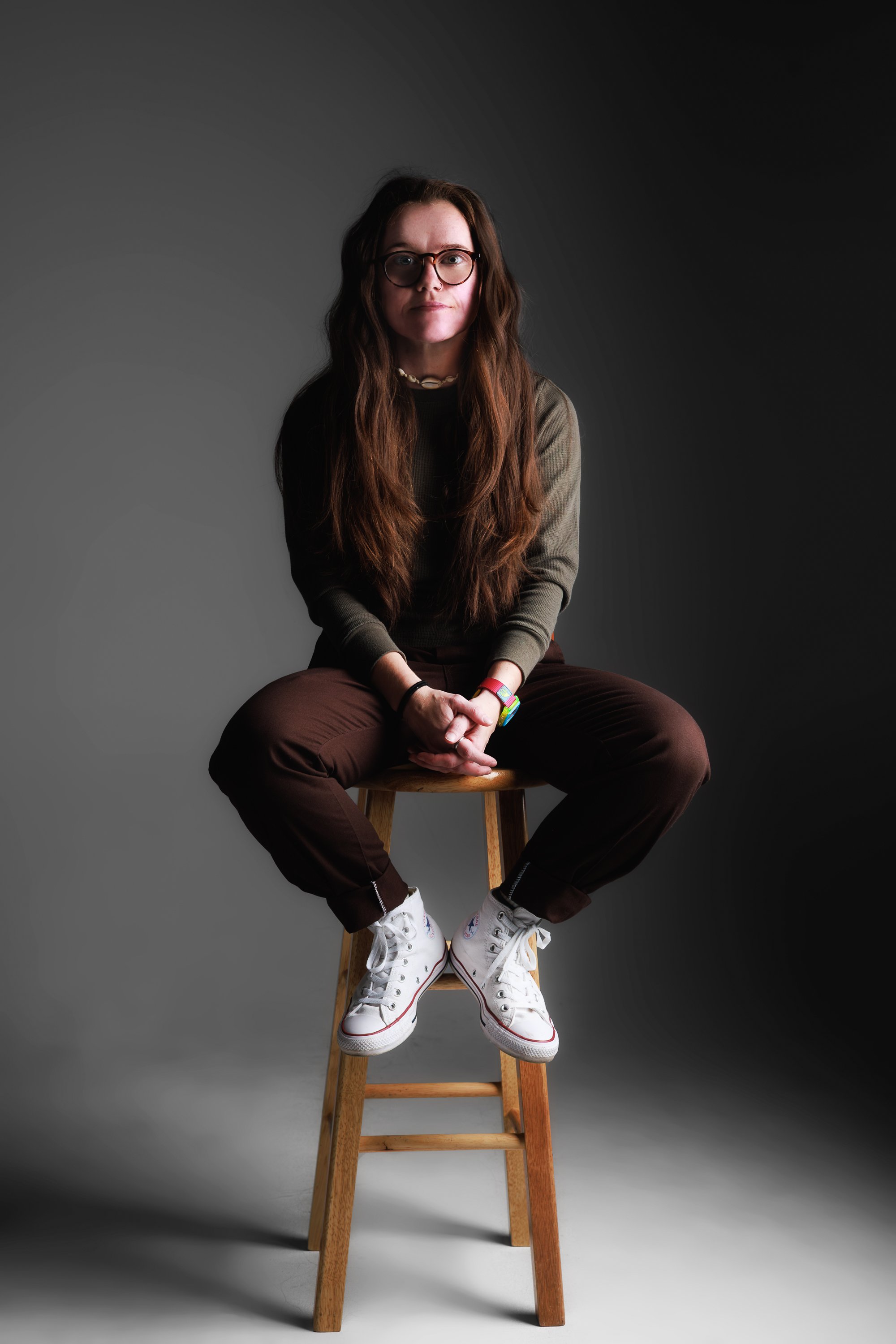 Jess Dnea, Denver branding photographer behind Jessica Dnea Imagery, offering personal branding photos, studio portraits, artist photos, musician press images, creative portraits, and event photography across Colorado.
