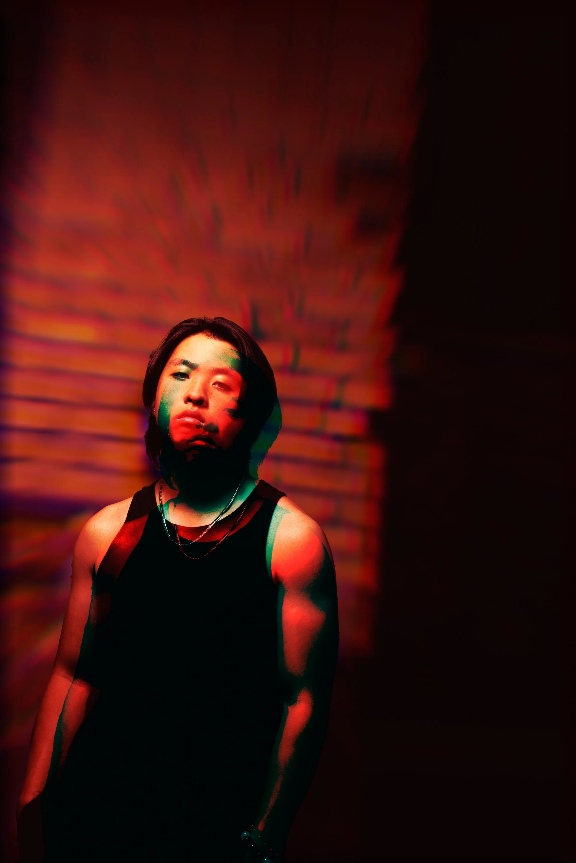 On-location DJ promo portrait in Denver’s RiNo Art District for EPK and artist branding use.