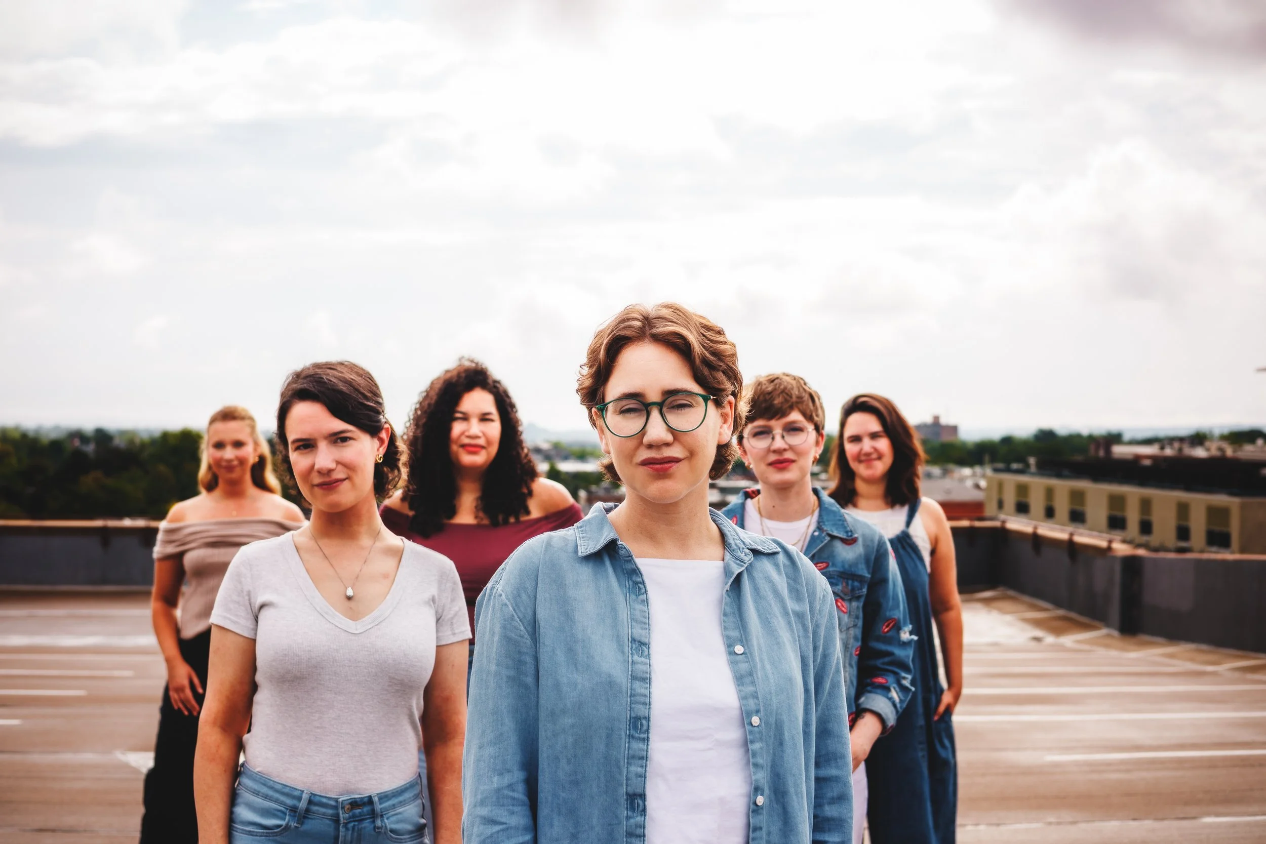 Lyyra press portrait in Boulder, Colorado featuring the vocal ensemble in a rooftop setting with natural light and coordinated group composition for press, touring, websites, and promotion.