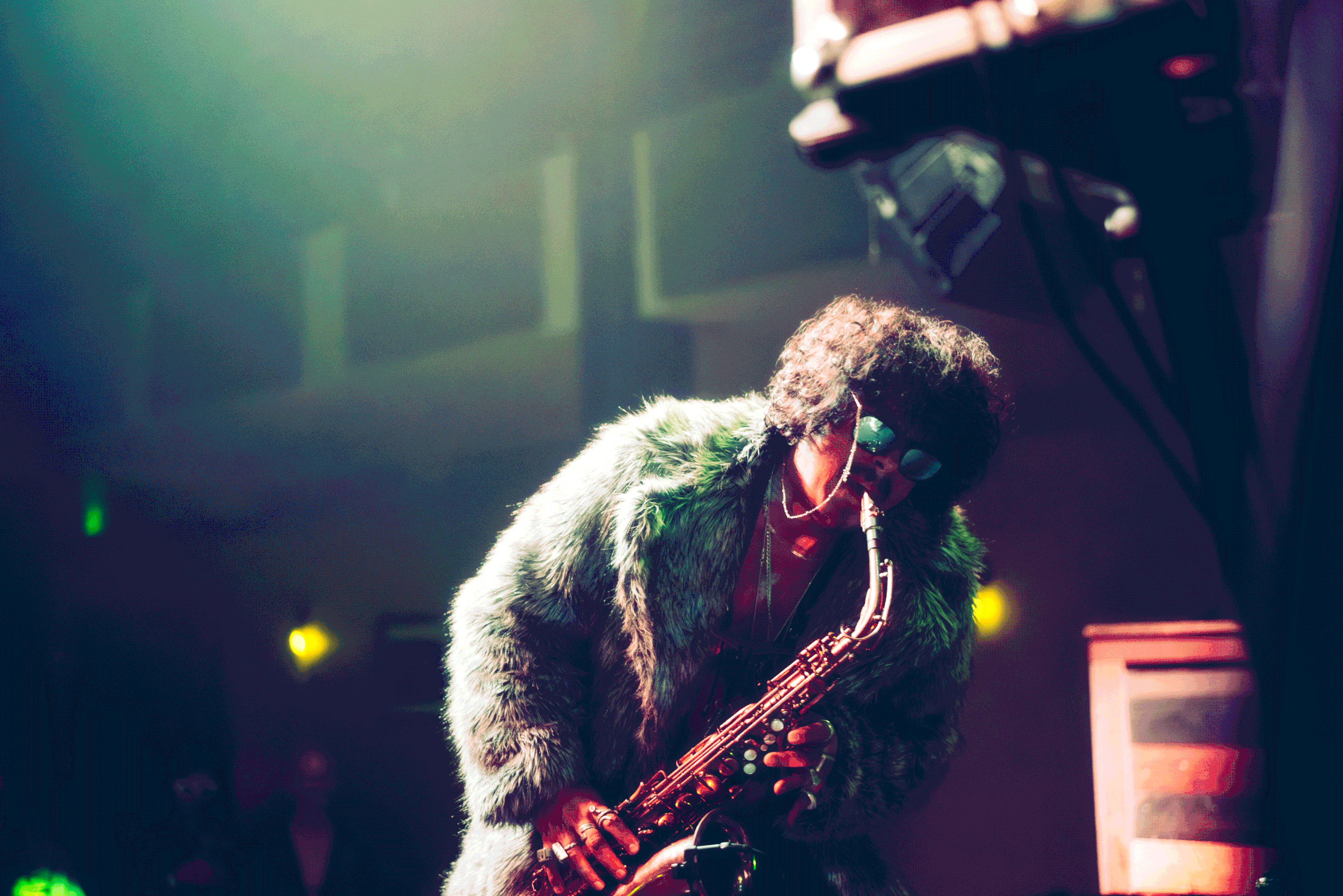 Live music photography tips for shooting better concert photos in low light with stage lighting, movement, and artist energy.