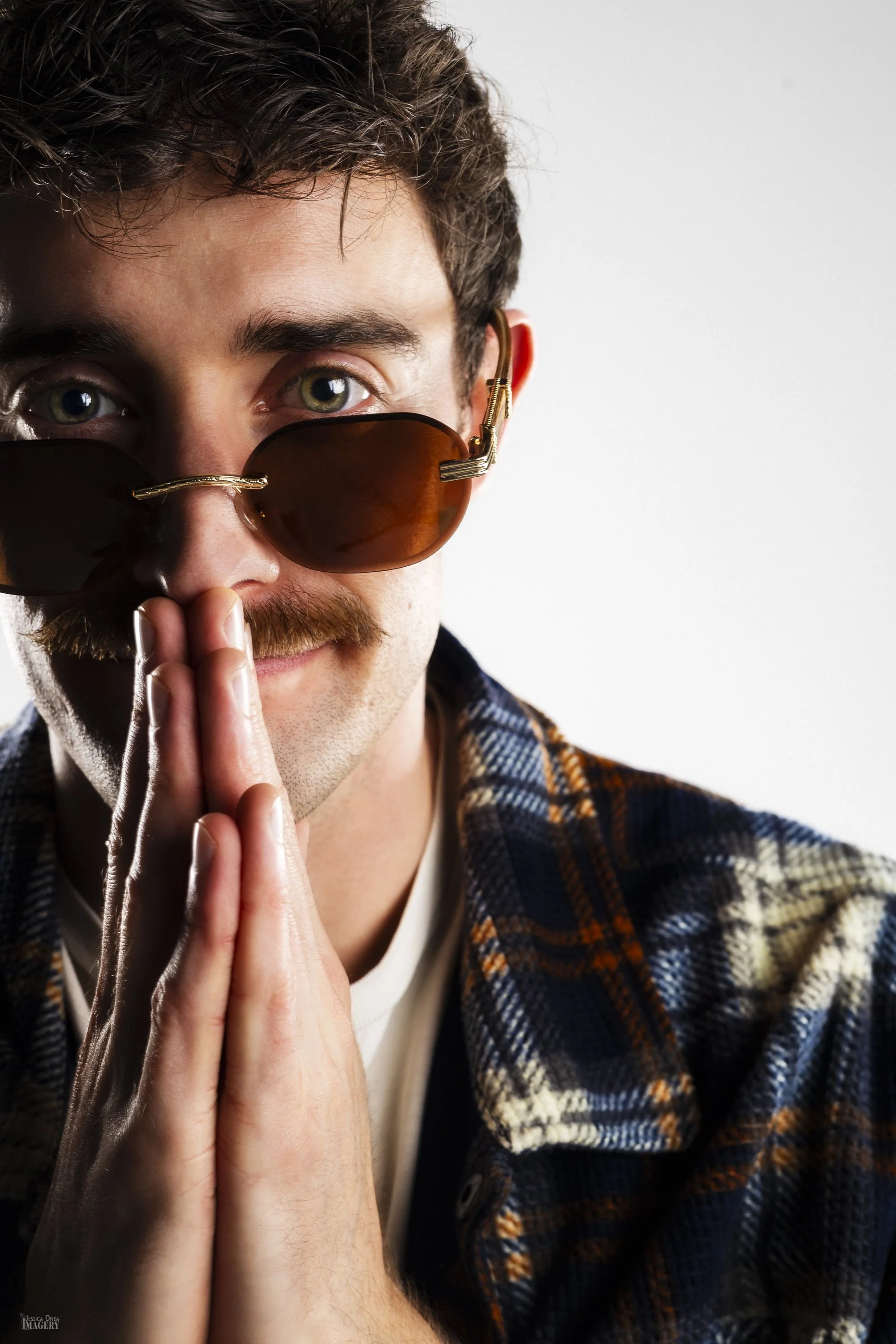 Editorial-style studio portrait with intentional lighting koy.wav dj