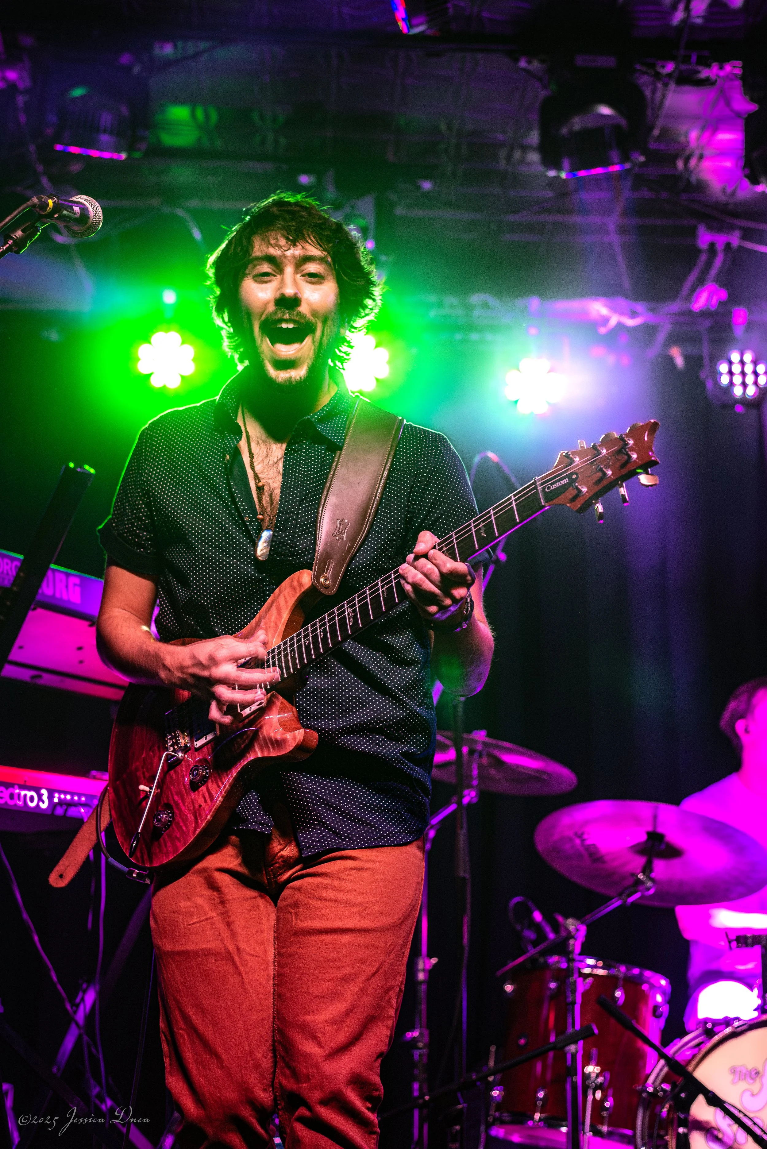 Concert coverage photo of a live performance in Colorado Globe Hall