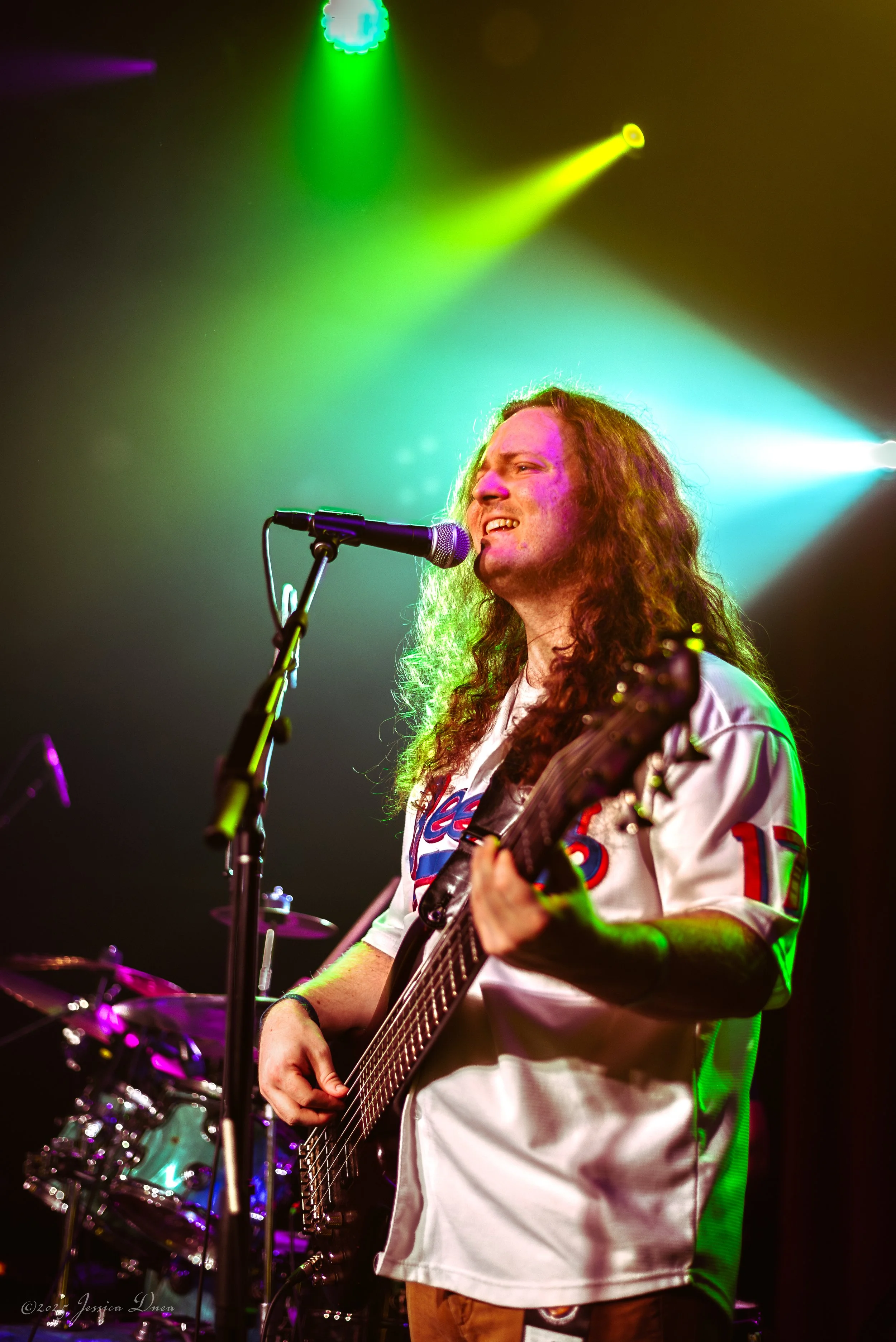 Live show photo with stage lighting and venue atmosphere Rado Denver, CO