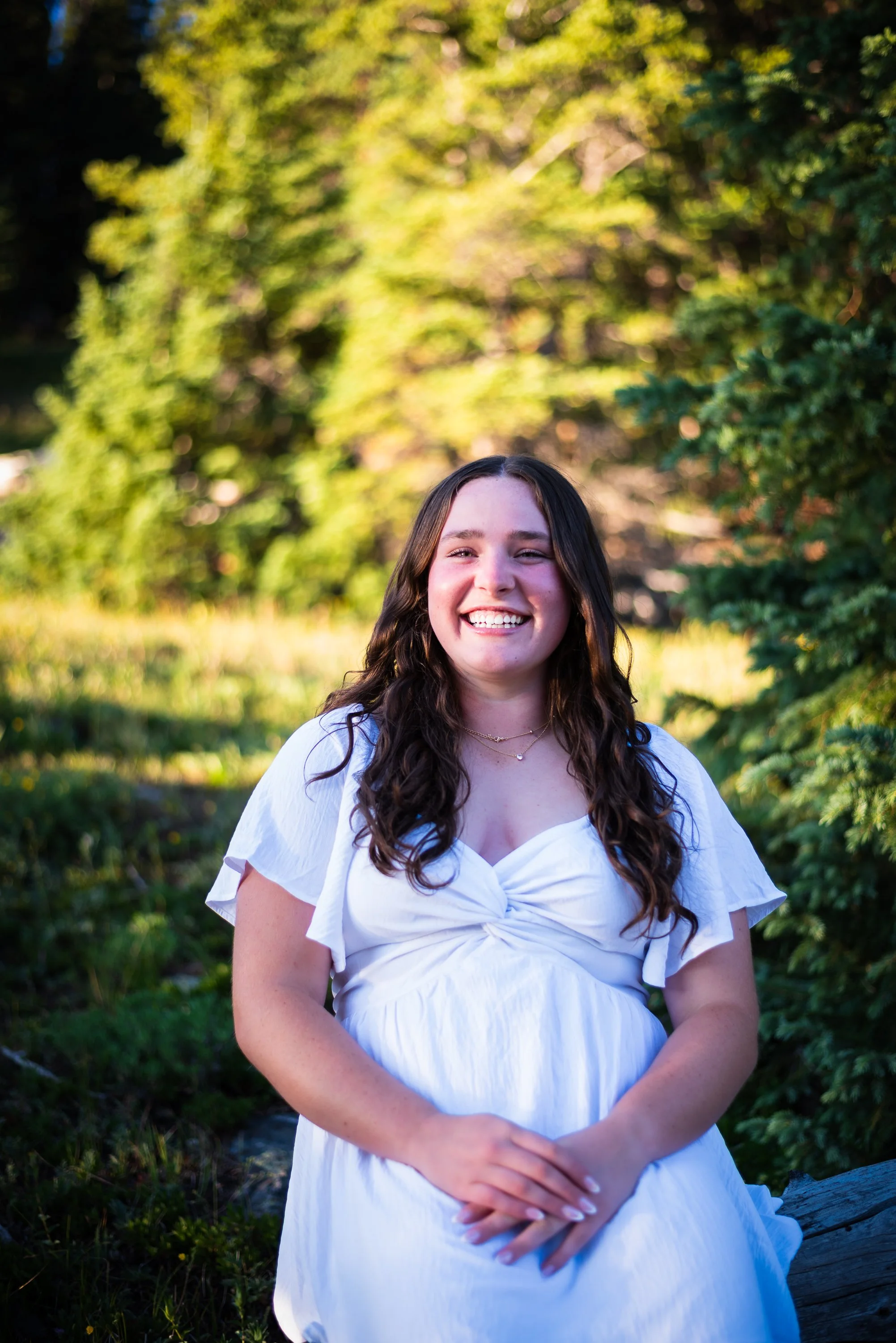Studio senior portrait in Denver with controlled lighting and classic portrait styling.