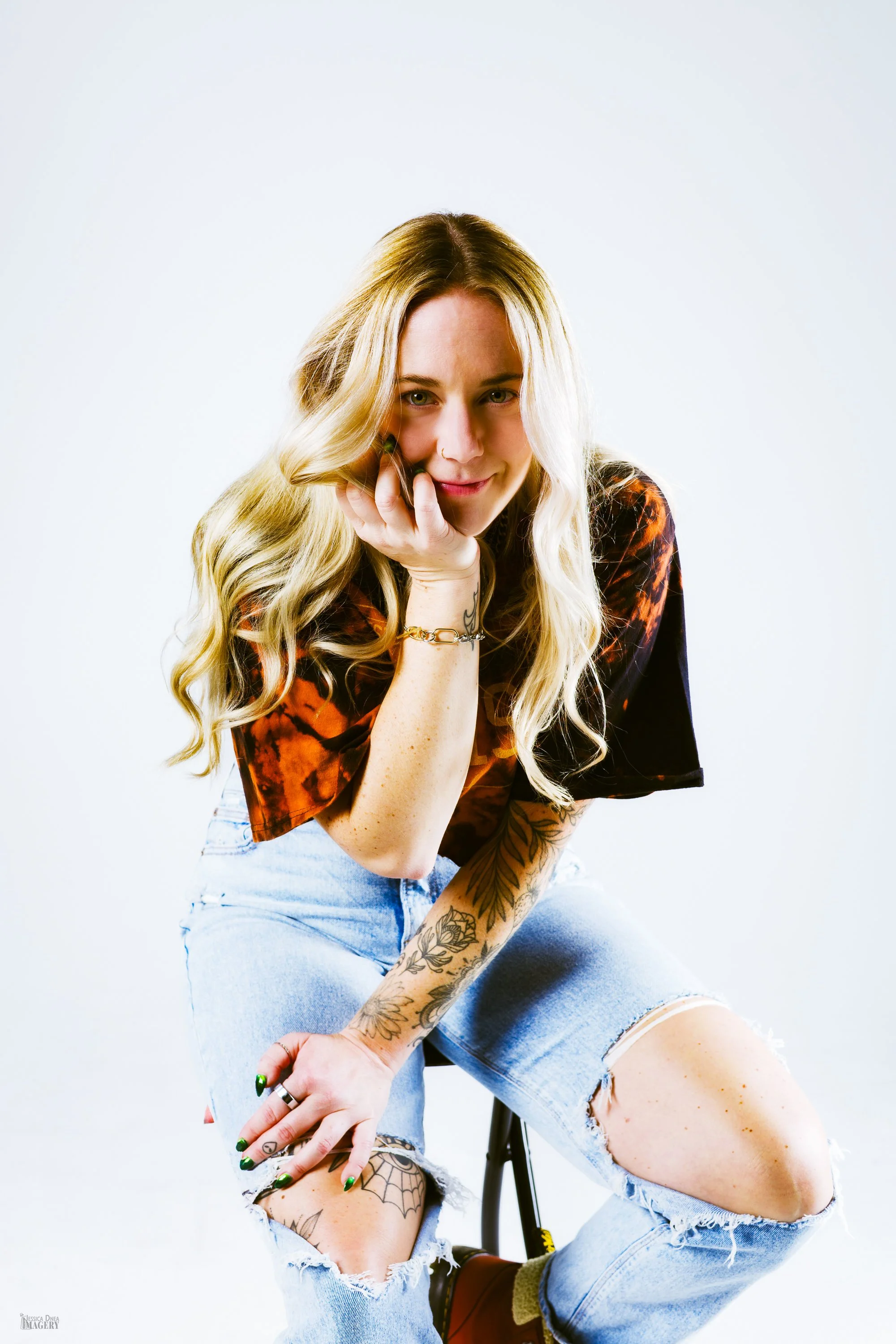 Studio portrait image with clean, polished look Sarah Winn