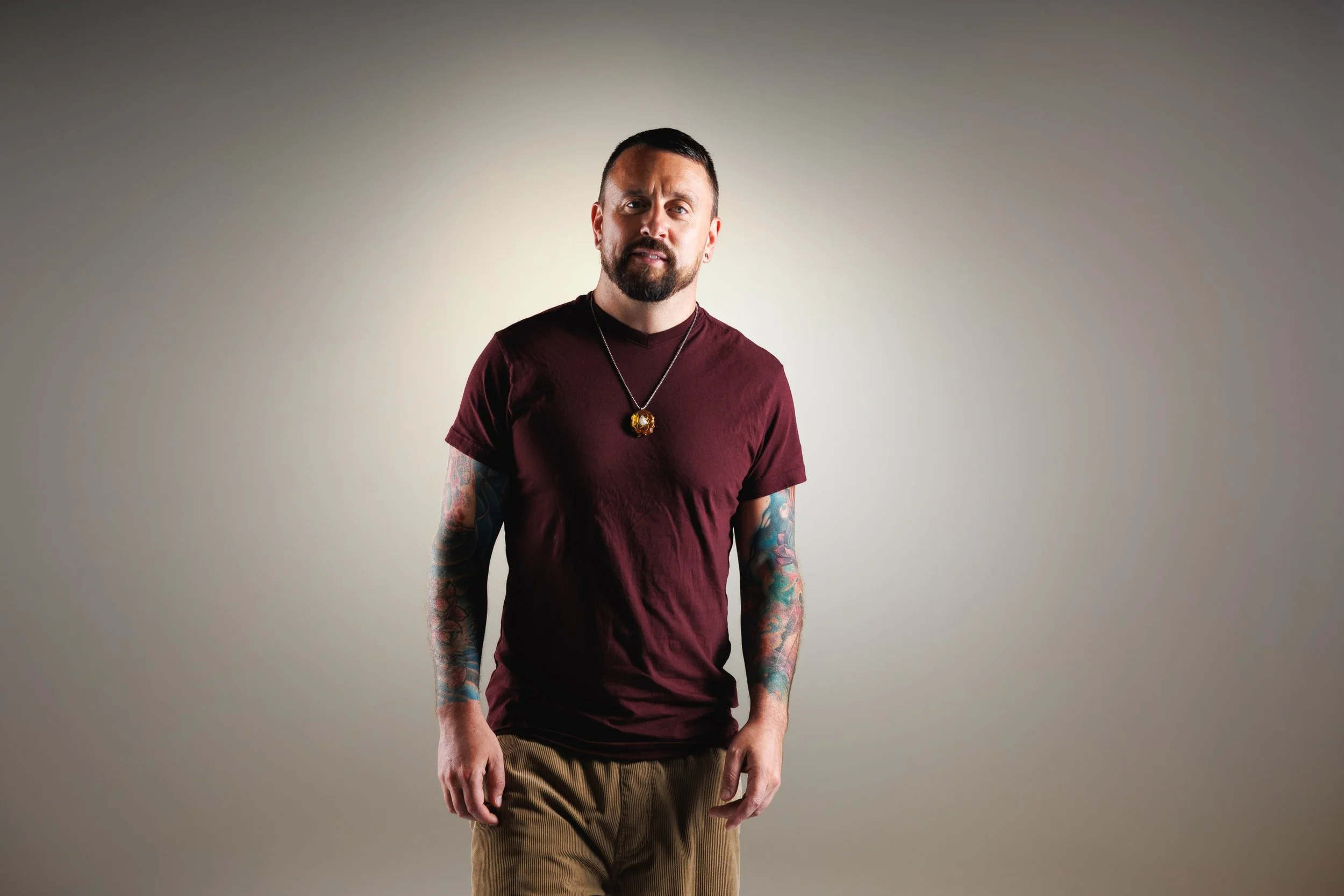Standing professional branding portrait with negative space for website text and promotional graphics by Denver photographer Jessica Dnea Imagery.