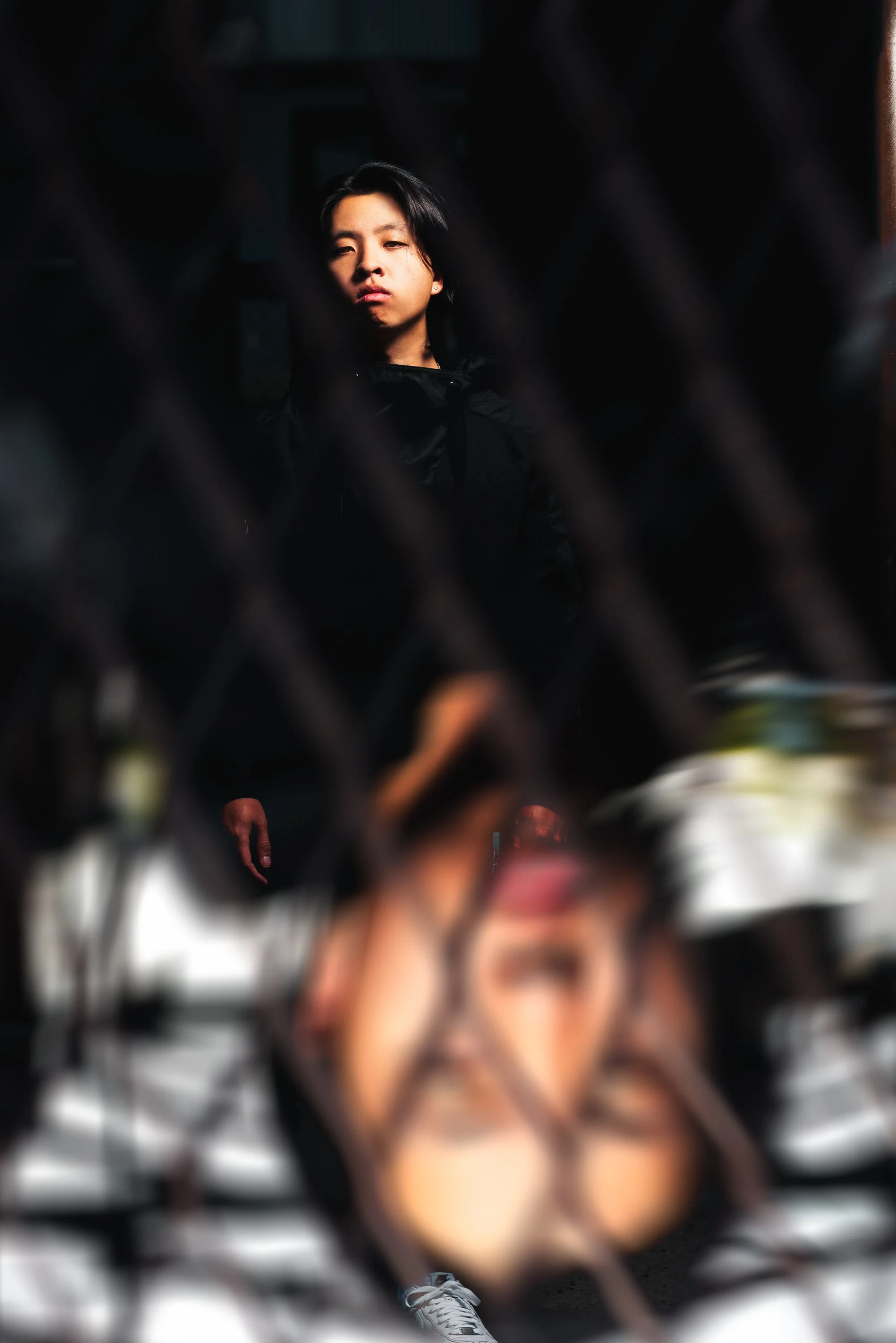 Dark Denver musician press portrait with industrial styling and dramatic creative lighting for artist branding, EPK images, release promotion, and editorial music photography. (This is the one image the image server wouldn't render for me individuall