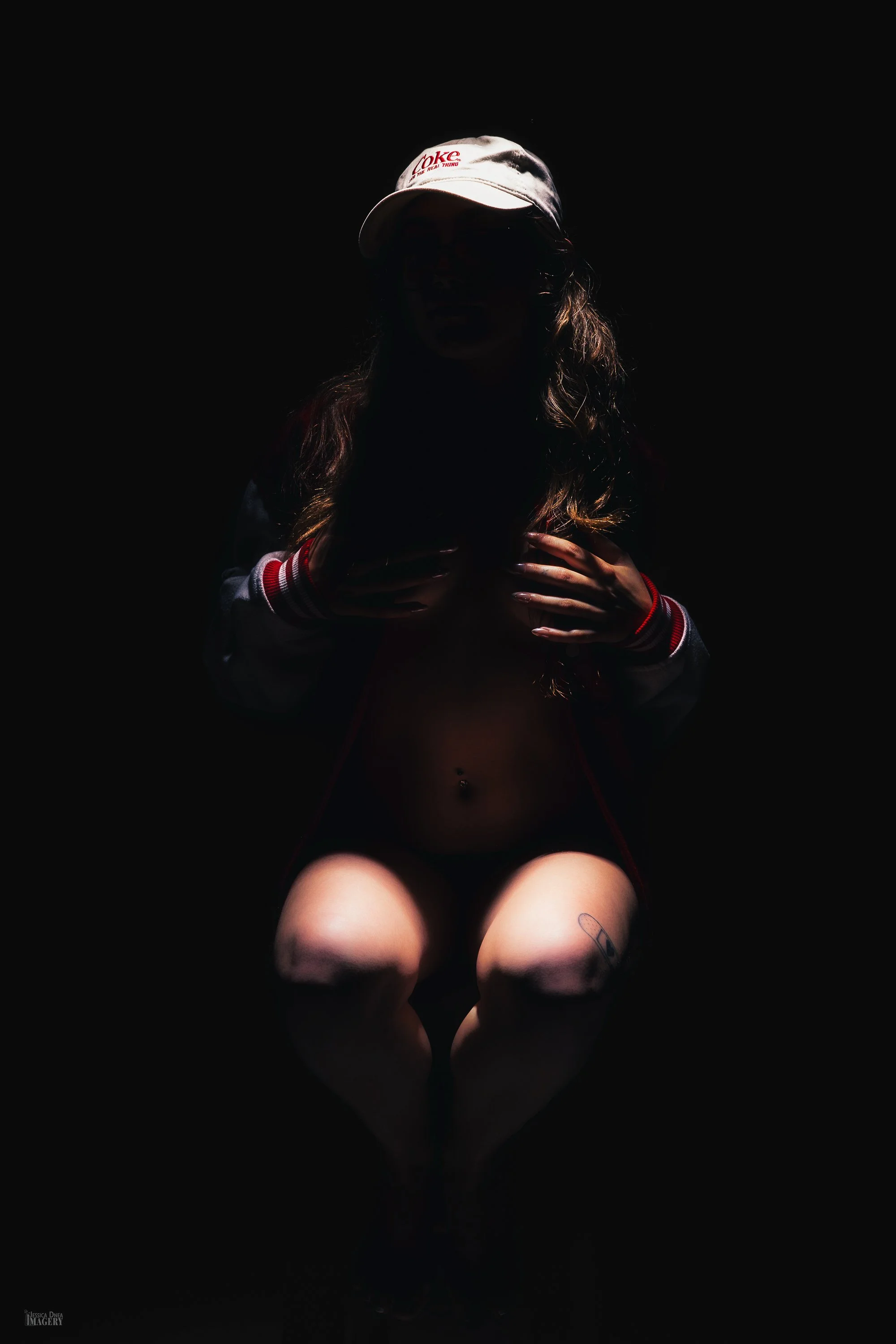 Studio portrait session in Denver with clean lighting and directed posing.
