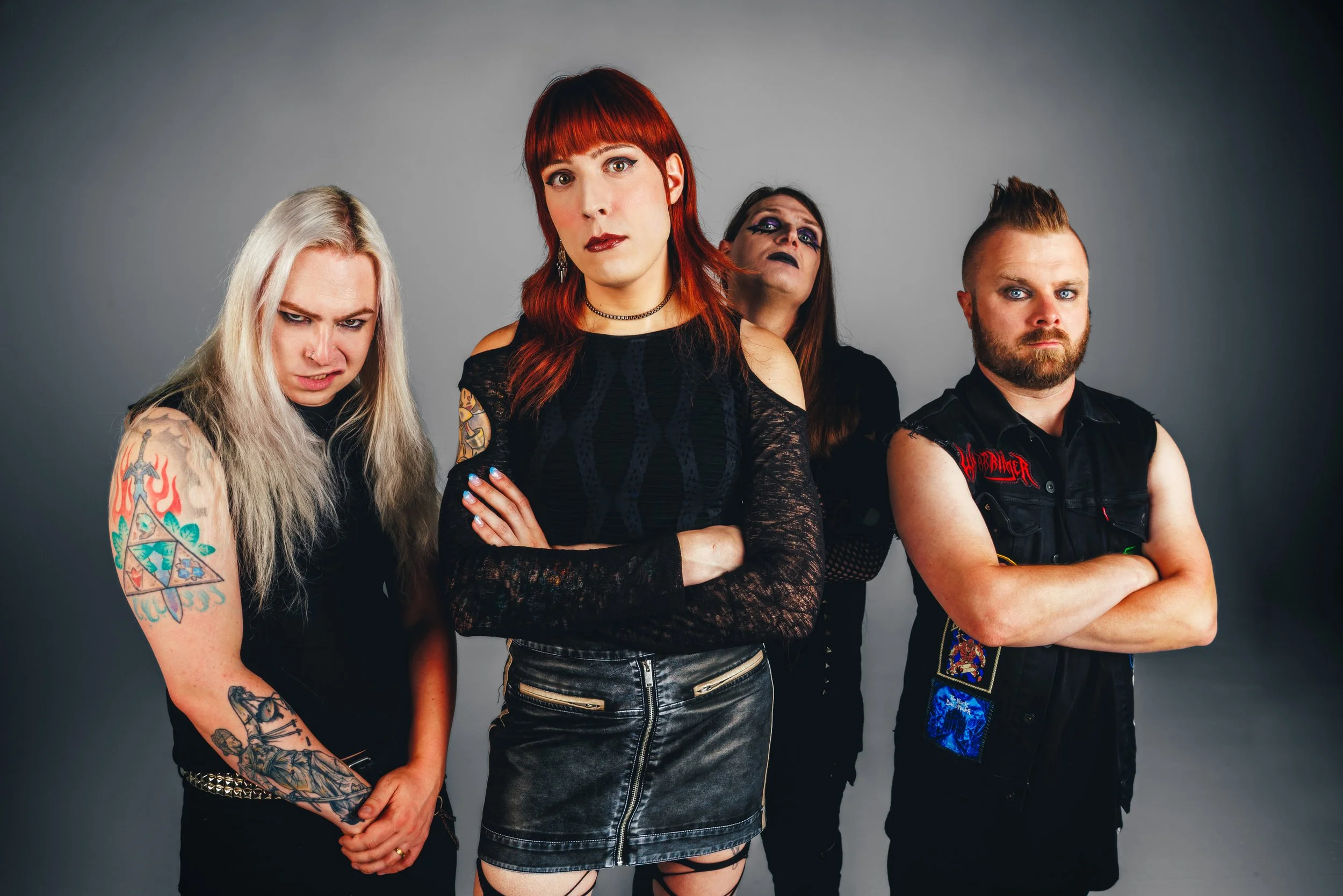 Denver band press portrait featuring Celestial Wizard with dark styling, dramatic expressions, and a clean studio setup for EPKs, releases, artist promotion, and music press