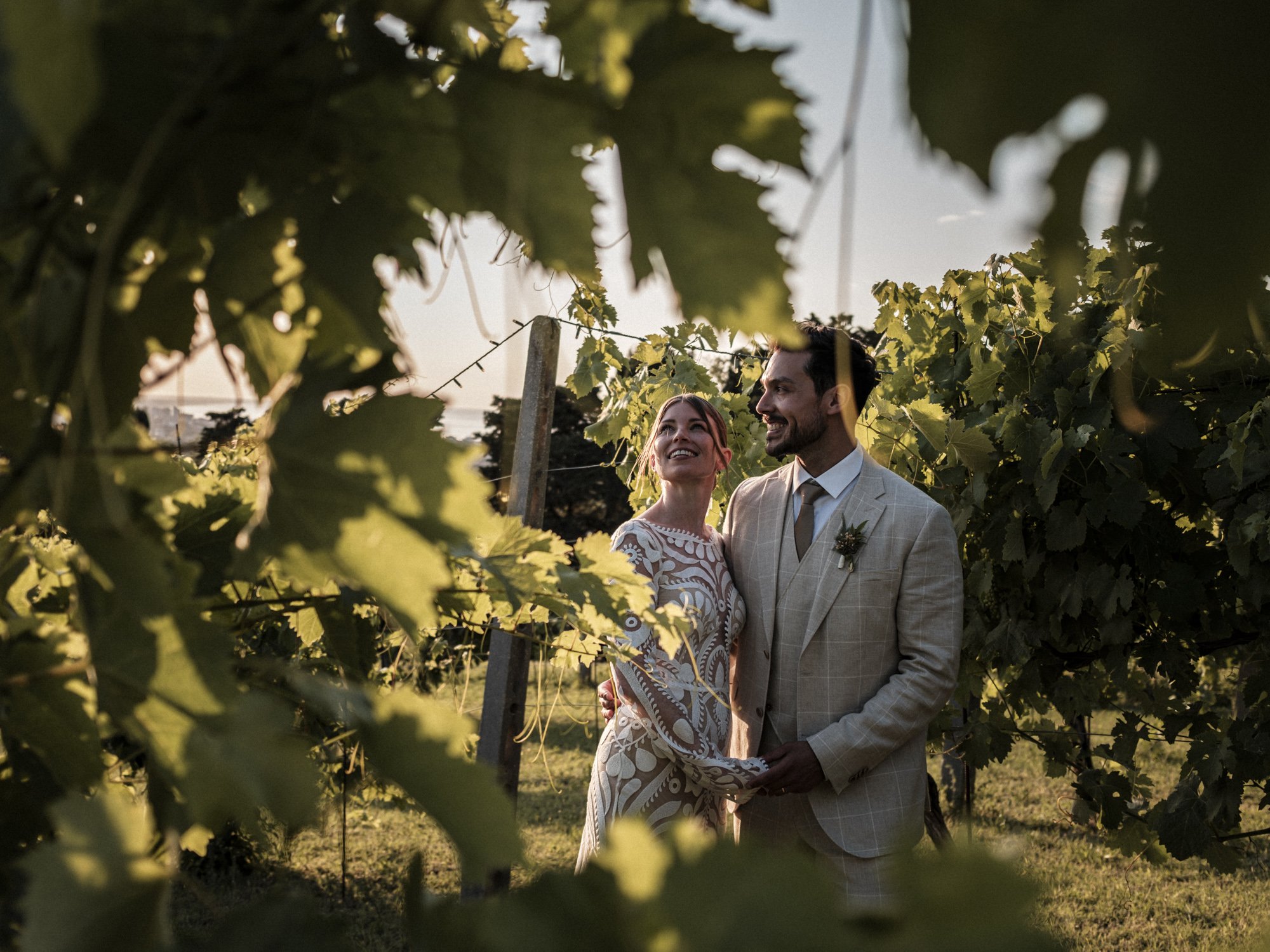 a-weddings, wedding, destination weddings, destination wedding planner, newly wed, bride, groom, bride and groom, holding hands, smiles, smiling, love, wineyard, italy, italian wedding