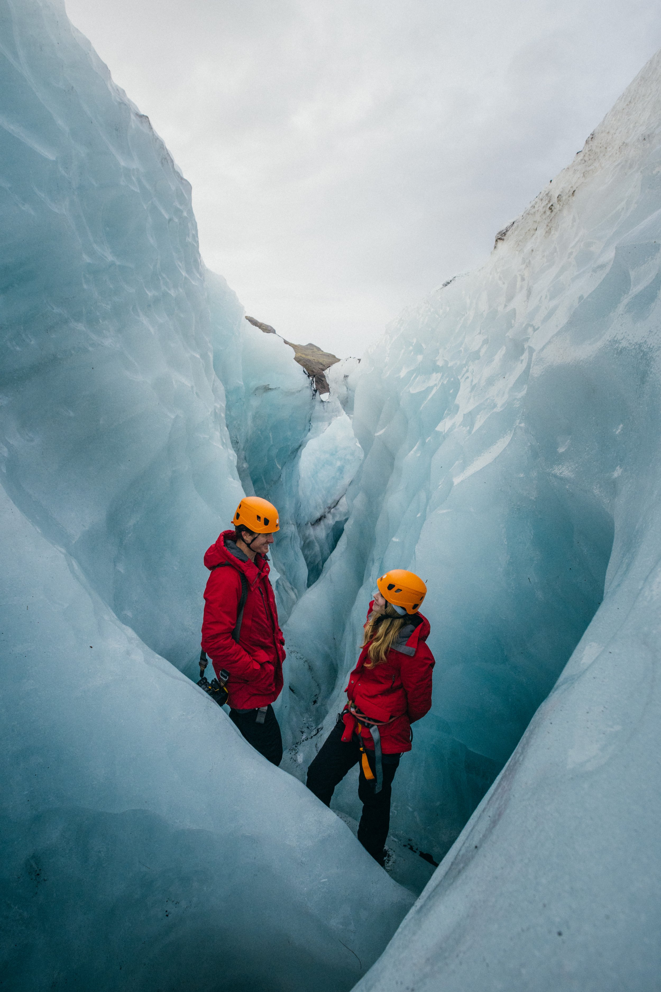 Couple hiking on a glacier in Iceland