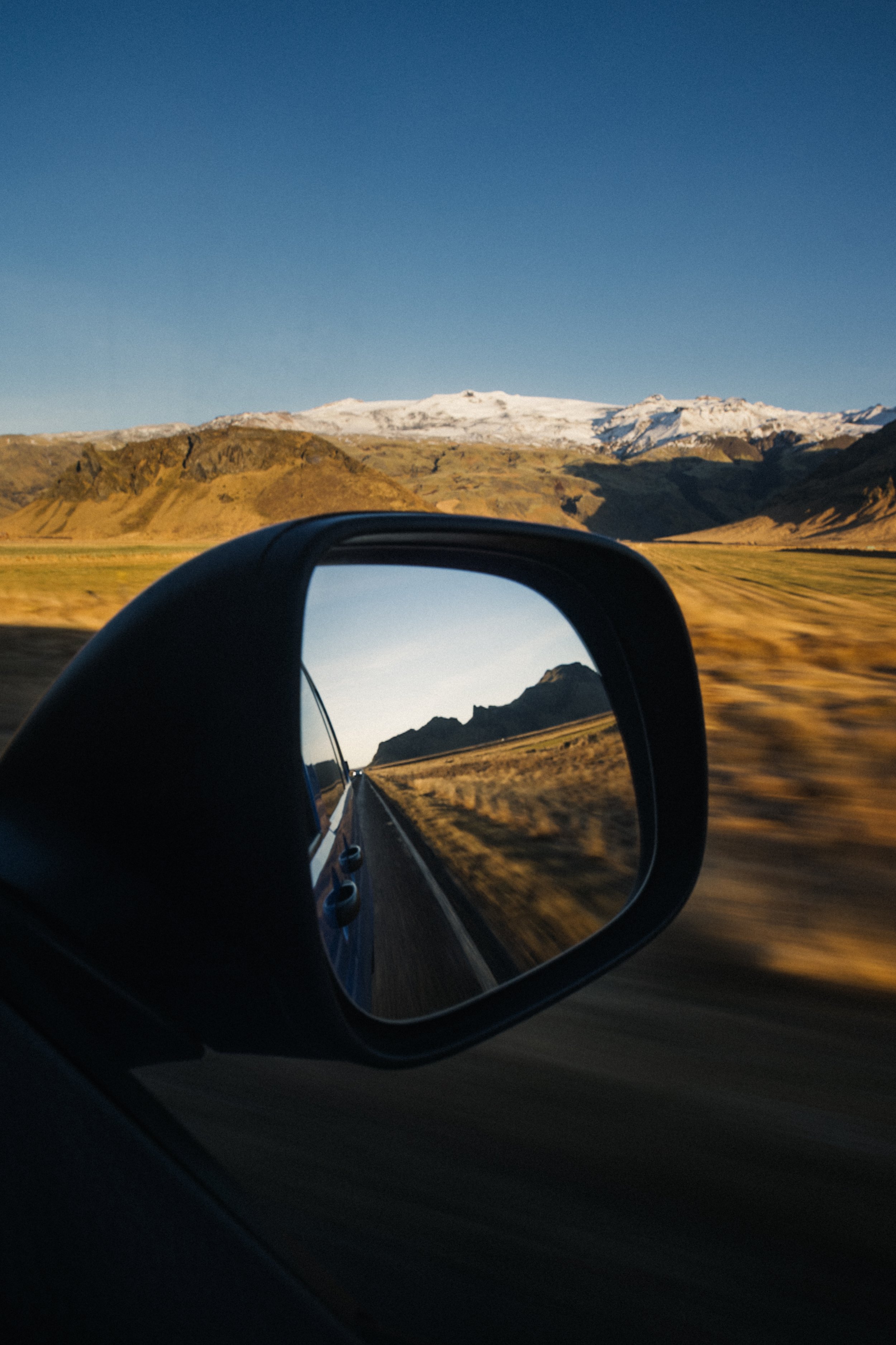 couple giving tips for driving van across iceland highway