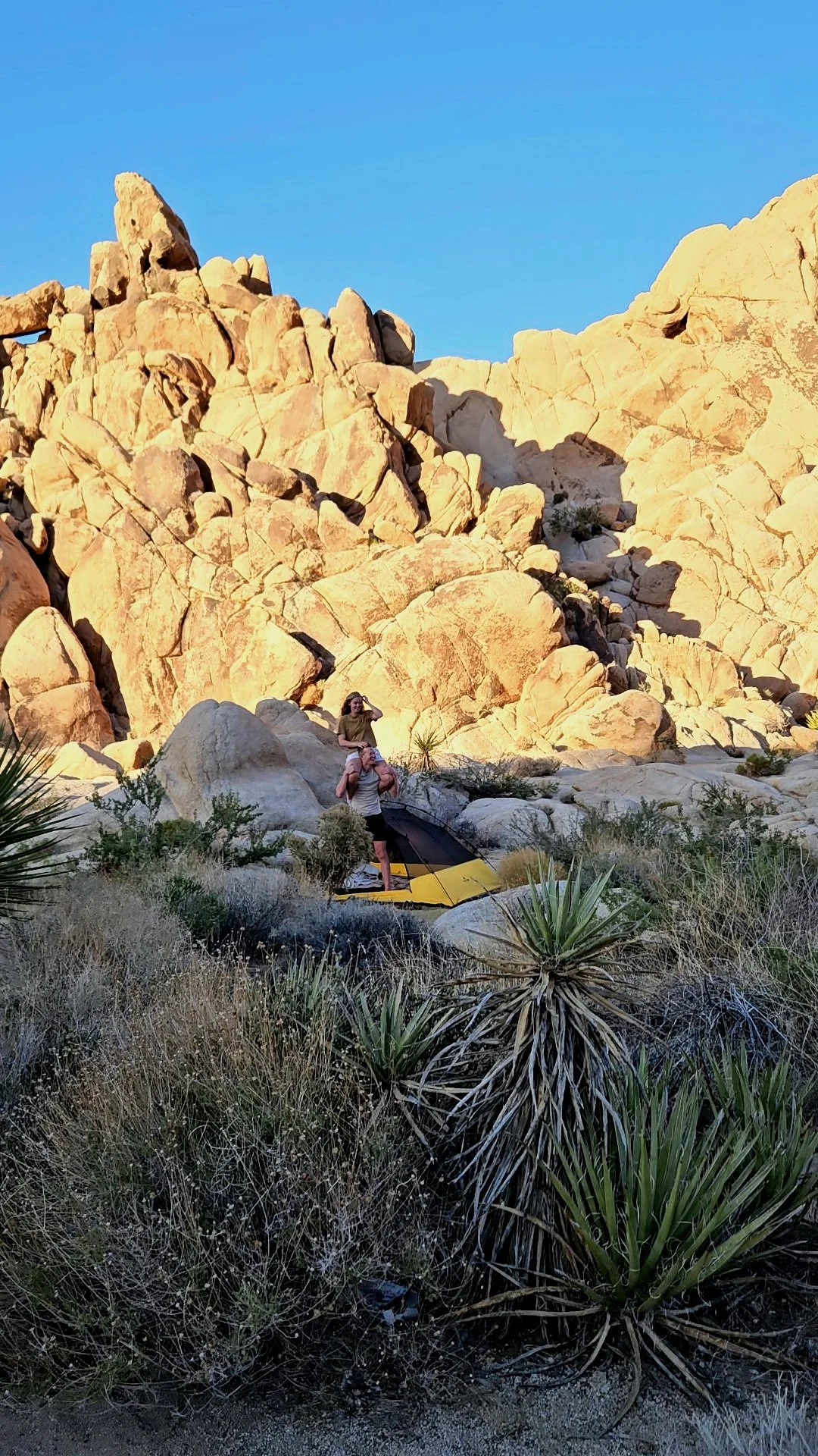 Couple at desert campsite in Joshua Tree National Park