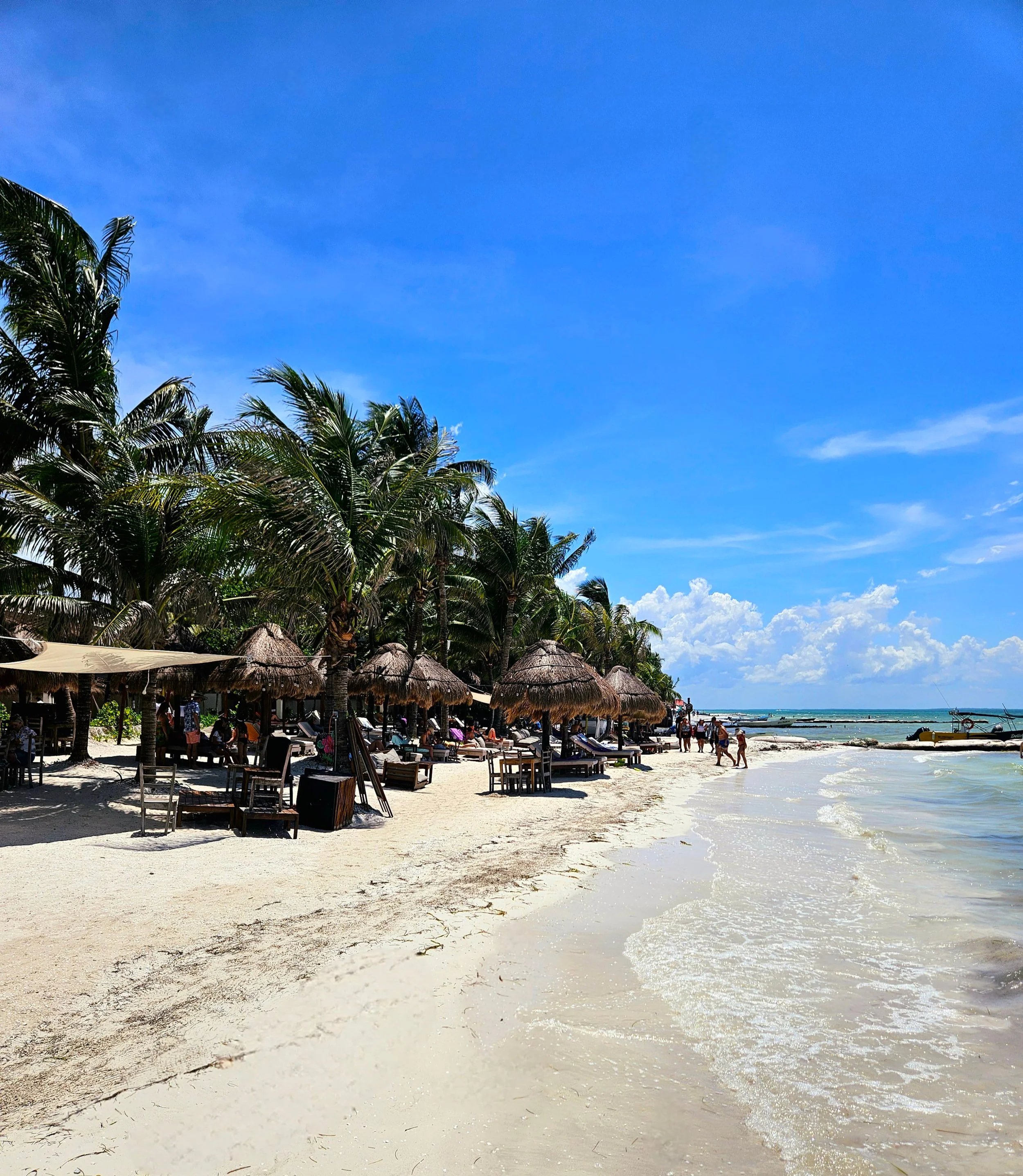 Hammocks hanging over the ocean in Holbox