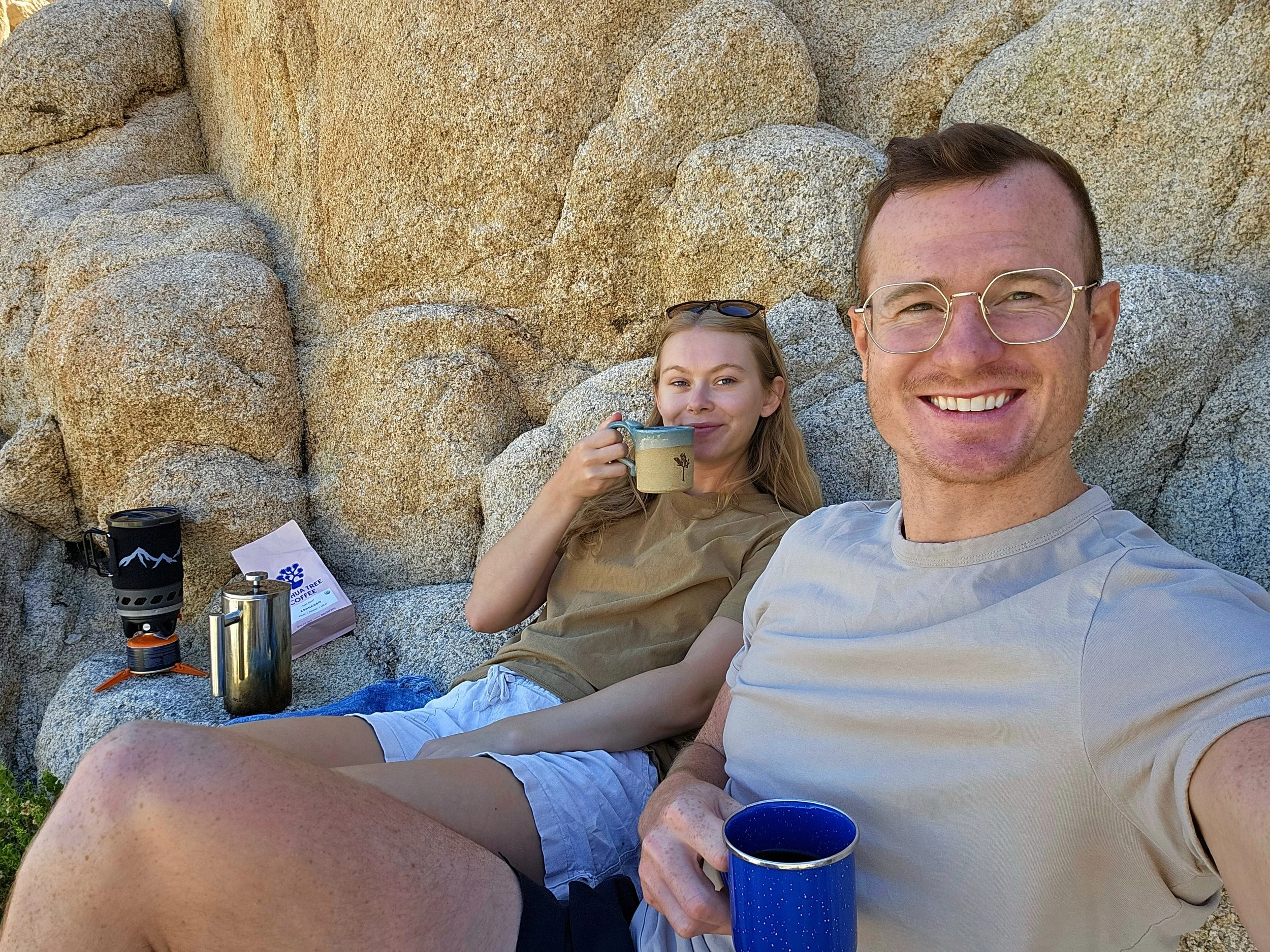 Travelers enjoying coffee at a desert café in Joshua Tree