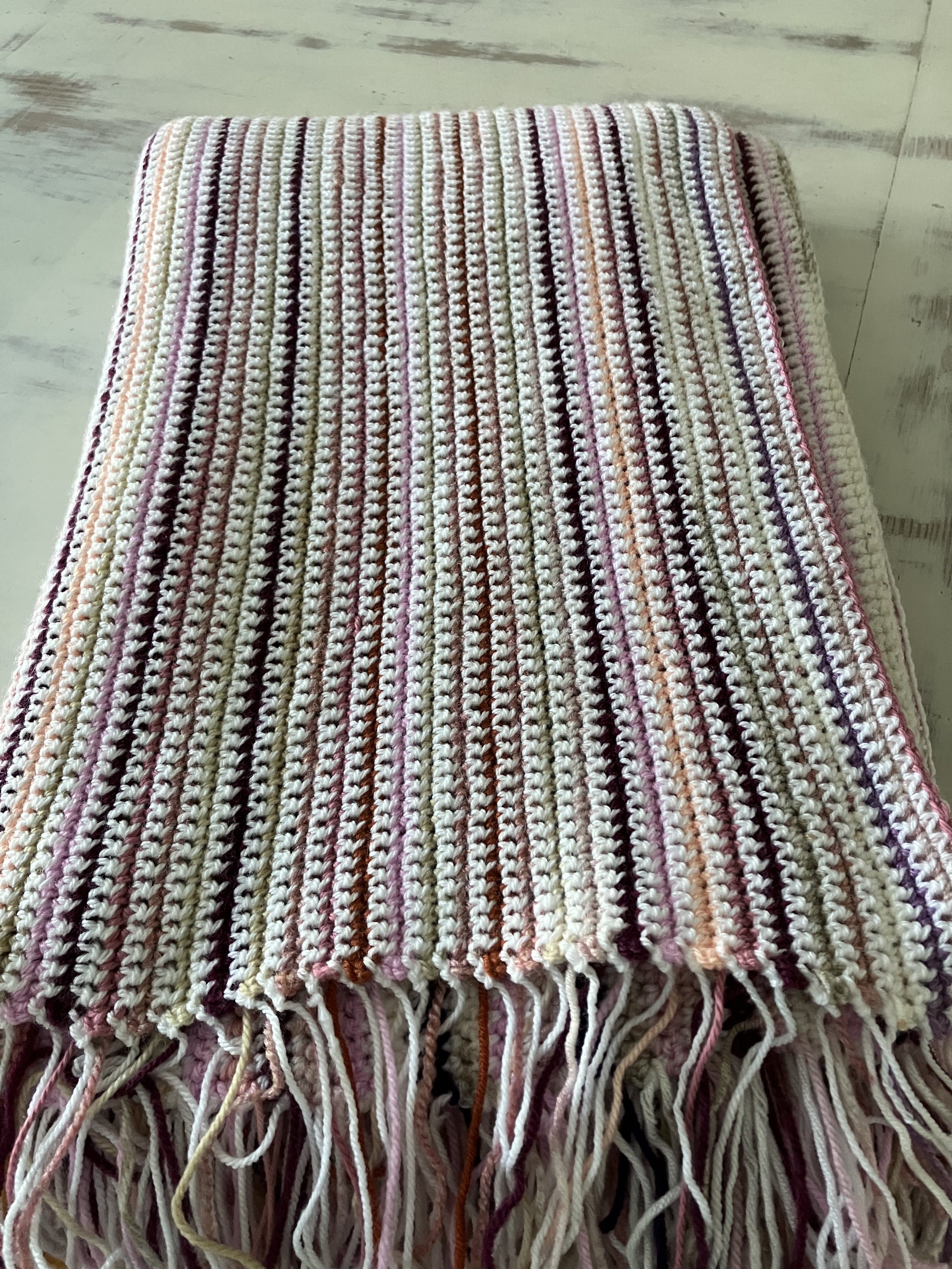 Suffolk pinks of all shades in this camping blanket