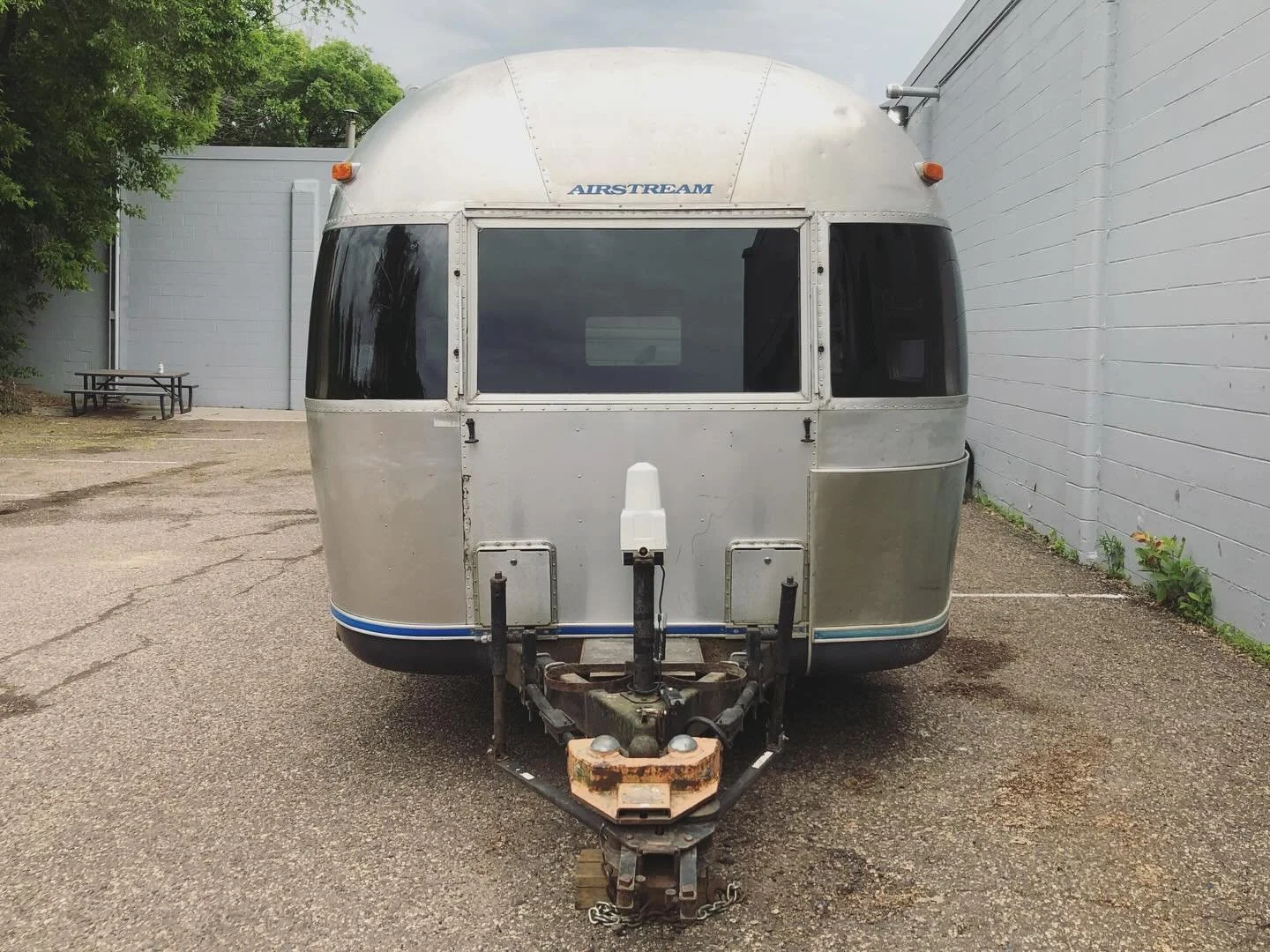 Polishing Process

The polishing of the Erratic was an incredibly anticipated moment for us both. We have always envisioned the vintage airstream settled in the woods with a mirror finish playfully reflecting the surrounding forest and practically di