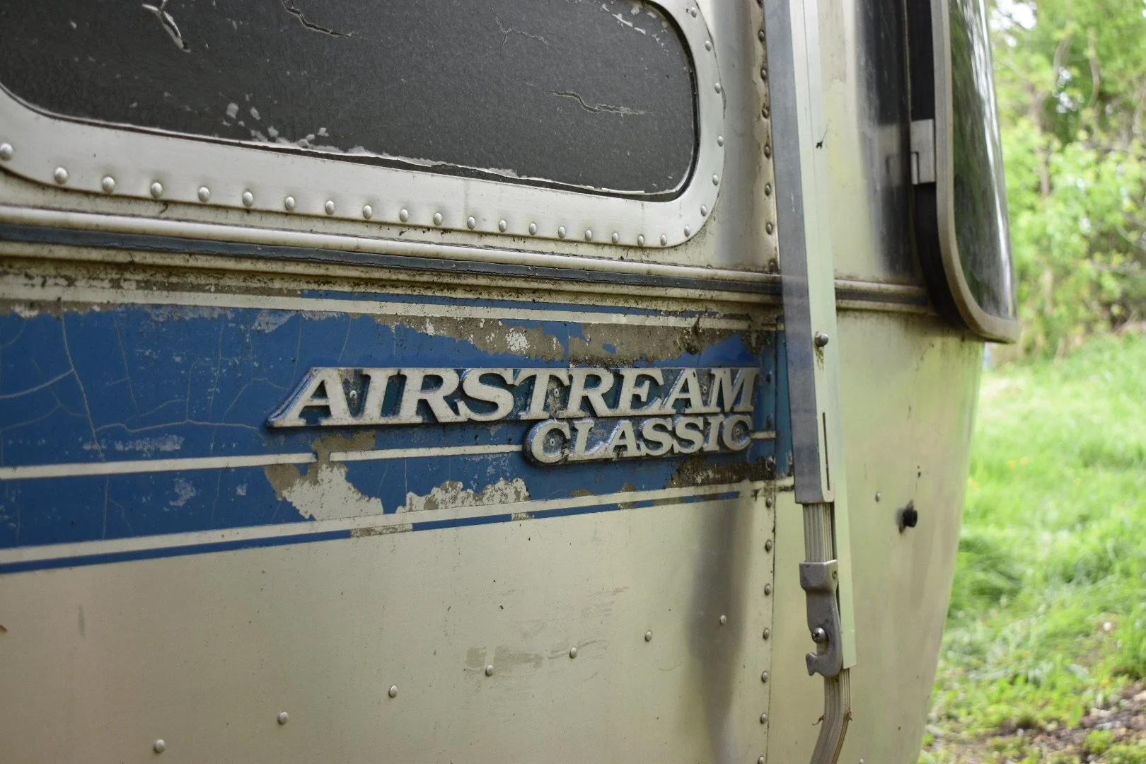 Exterior Decal Restoration

We removed our 6 original cast-aluminum nameplate decals from the erratic in preparation for the exterior cleanup and polishing. These had a lovely patina after spending time in the woods near Brainerd, but were destined f