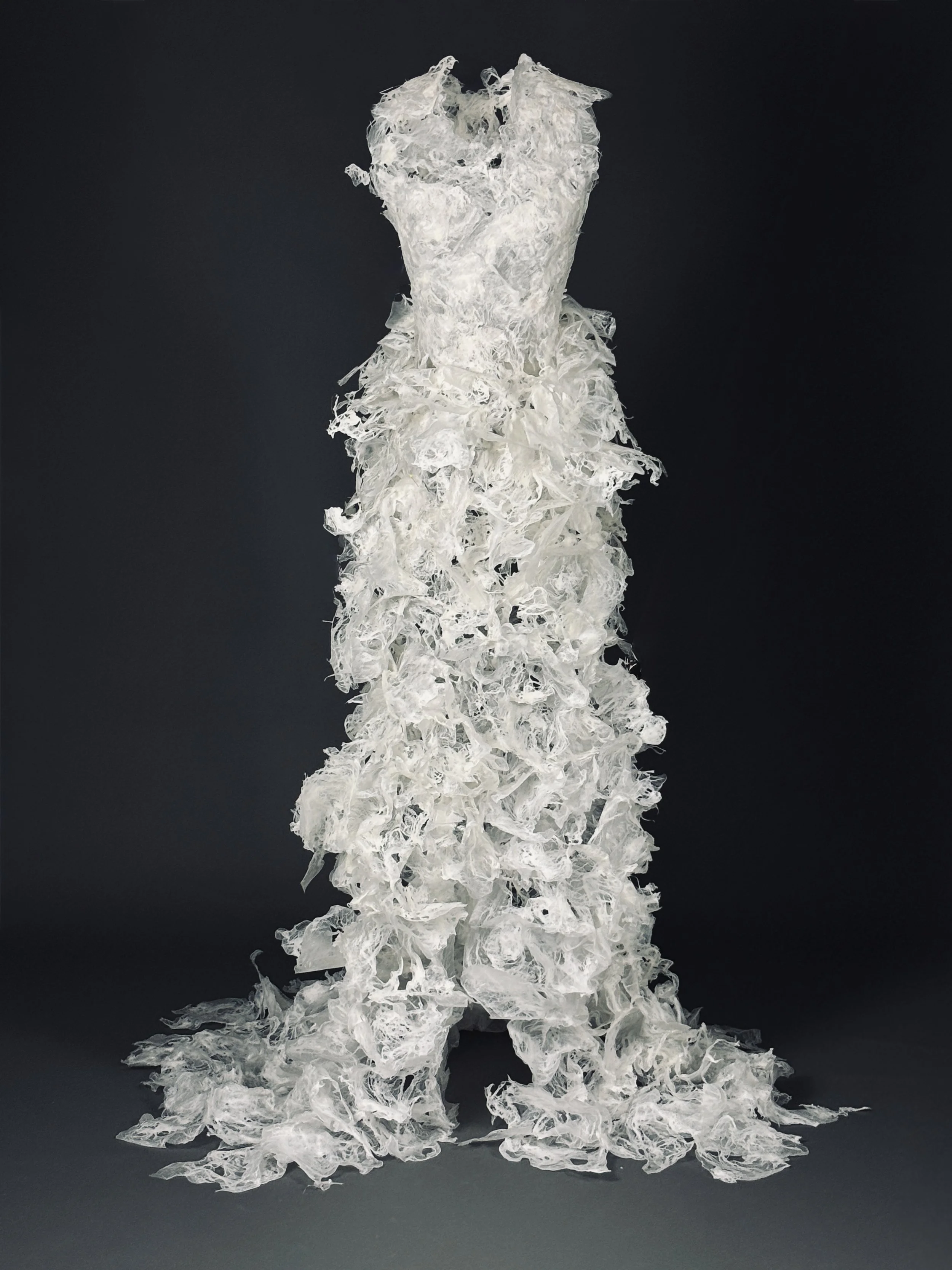 Susanne Williams | Disposable Vows: The love may die but plastic is forever , 2025 | Heat-fused, sculpted plastic trash bags 