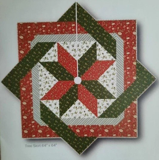 Quilted Christmas tree skirt featuring an intricate woven star pattern in red, green, and cream fabrics, with a central opening and a slit extending to the outer edge.