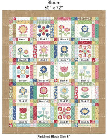 Bloom embroidered appliqué quilt layout featuring colorful floral quilt blocks arranged in a grid pattern.