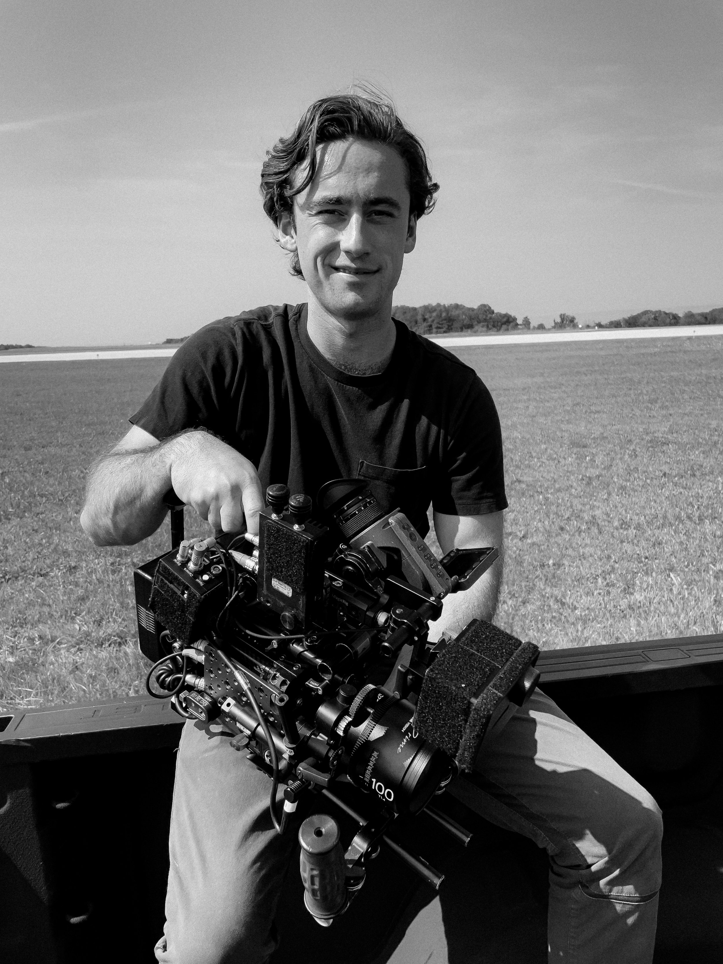 Nicholas Dorsey, director and cinematographer, holding a camera on a film set in San Francisco