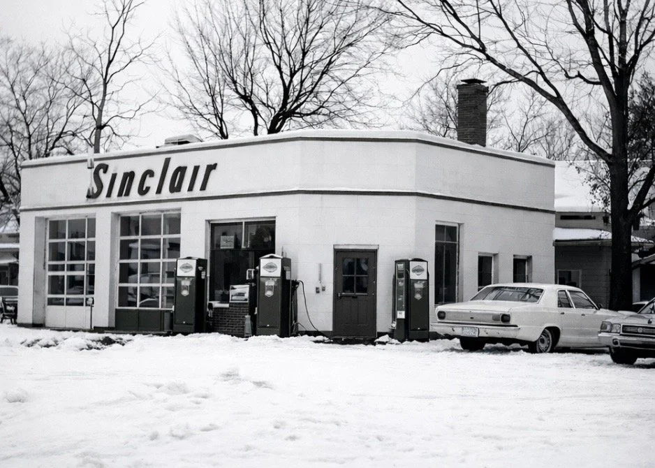 Historic photo of the building that now houses Butter & Batter Bakery when it operated as a Sinclair gas station in Lapel, Indiana.