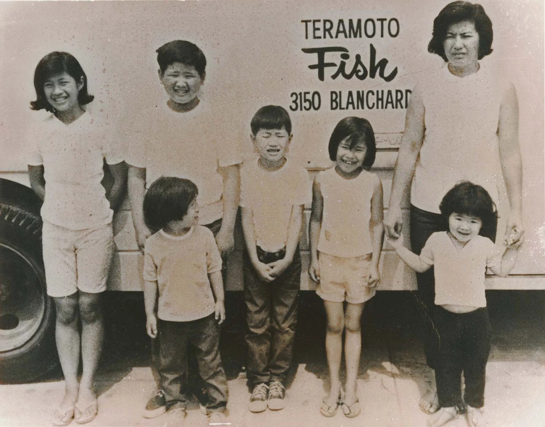 Family in front of Fish Truck
