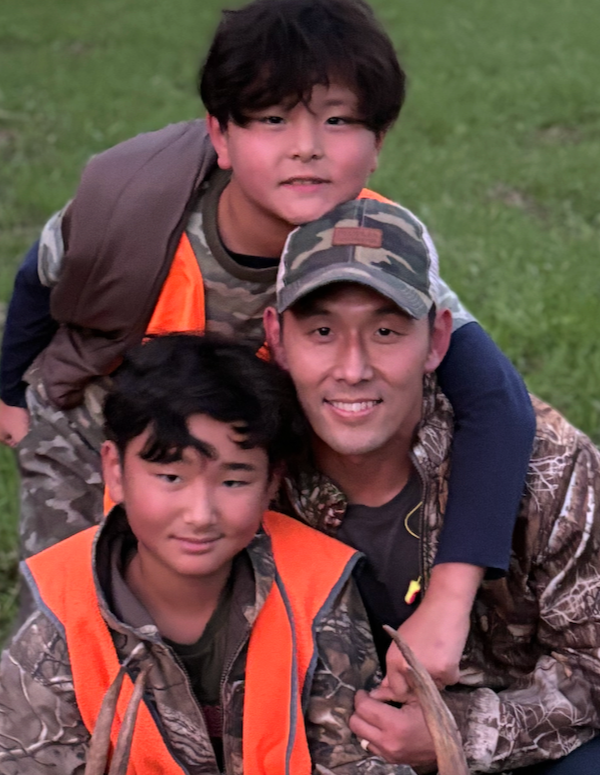 Joo Reynolds hunting with his sons with Adam Peoples.