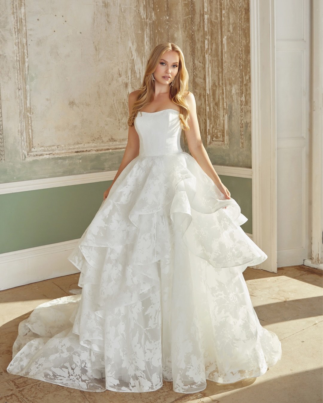 Layered to perfection ✨ Soft tiers and gentle draping create movement like poetry&mdash;each layer floats with every step. Our dreamy and romantic new arrivals are made for the bride who loves a little twirl-worthy fun and a dramatic entrance! 💃⁠
⁠
