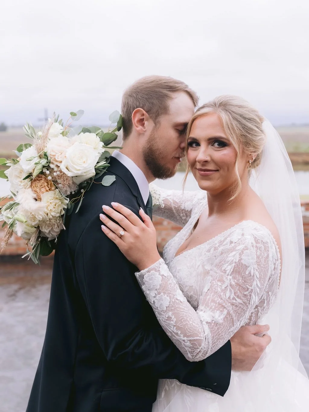 ✨Bride Spotlight✨⁠
⁠
⁠Jaylee was pure magic in her gown&mdash;rain and all. 🤍 Jaylee, thank you for choosing your dress with us and for being a Low&rsquo;s Bride&mdash;it means the world to be part of your forever story. Wishing you a lifetime of lo