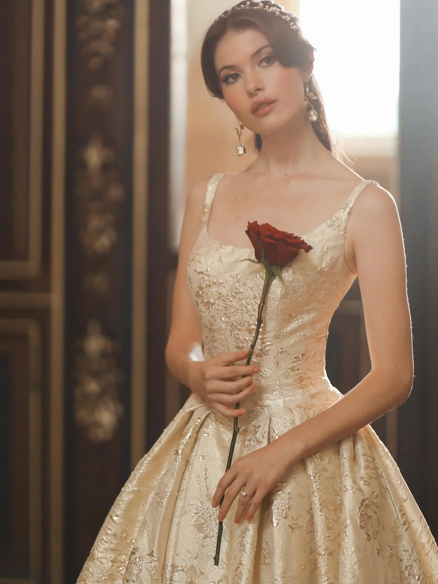 A tale as timeless as love itself ✨ Meet Belle, the newest Disney Fairytale Weddings gown to arrive&mdash; a golden dream come to life. With luminous metallic jacquard, a regal ballgown silhouette, and storybook sparkle in every fold, she embodies co