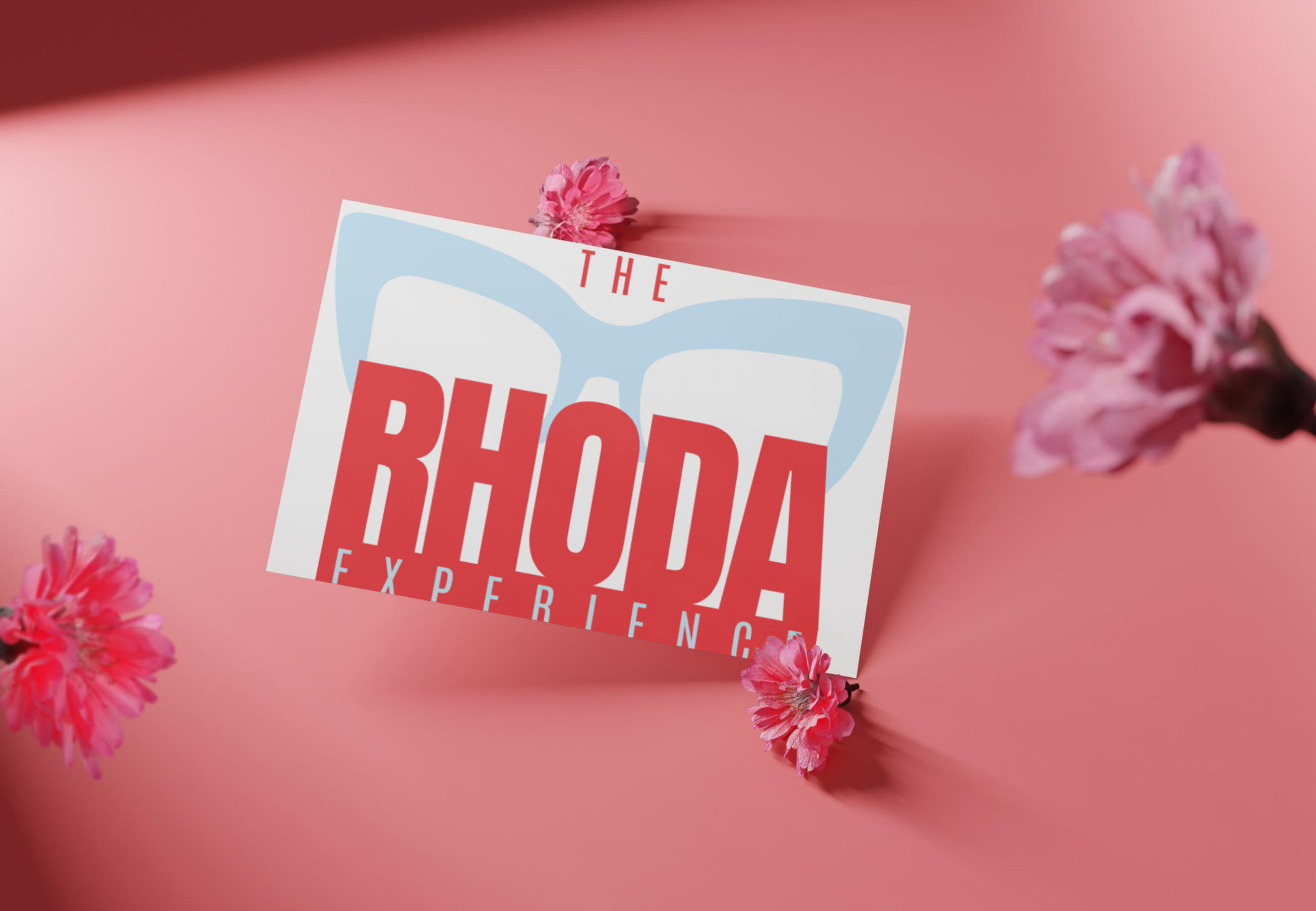 A pink background with a card displaying a stylized pair of glasses and the text 'The Rhode Experience', surrounded by pink flowers.