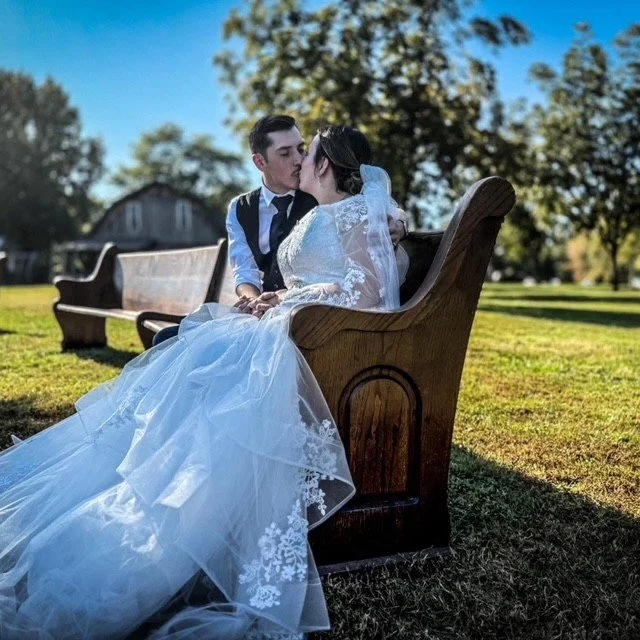 Noah and Bekah on pew