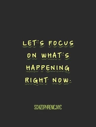 Text on a dark background that reads: "Let's focus on what's happening right now. schizophrenic.nyc"