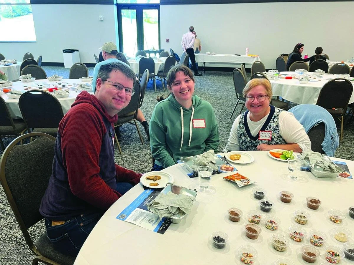Participants in a 3G Michigan event pose for a picture