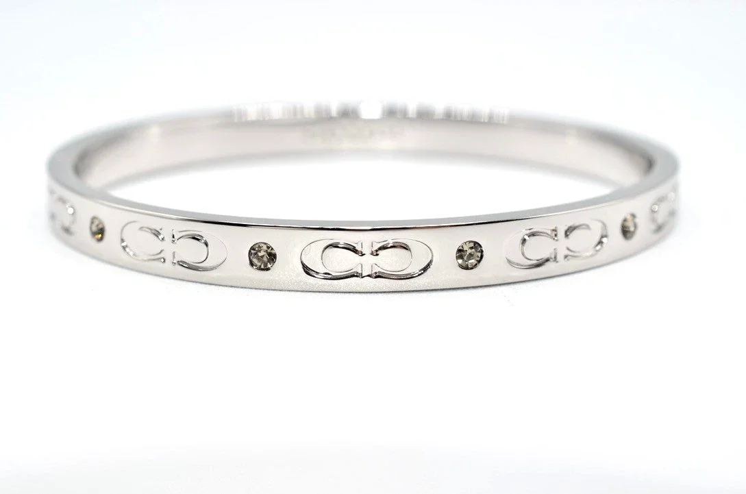 Coach Signature Kissing C Silver Tone Crystal Hinged Bangle Bracelet 26.9g