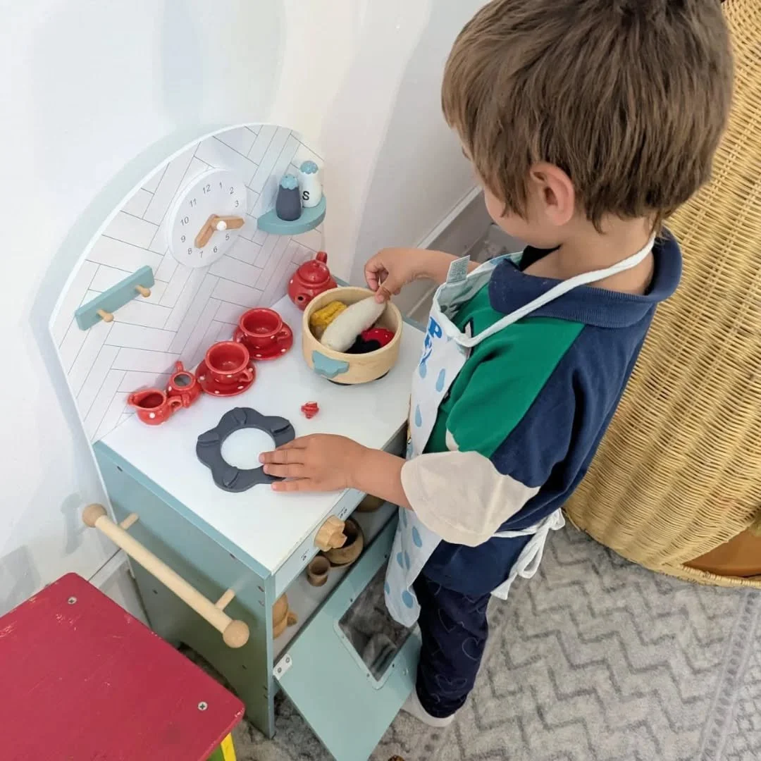 Play. Freedom and a universal childhood ( and adulthood ) language. 
Vehicle for curriculum delivery- or rather a way for adults to weave some adult learning into the lives of children.
The work of a child? 
Over the years I have gathered fascination