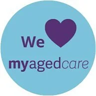 Logo with light blue background, purple heart, and text 'We love myagedcare'